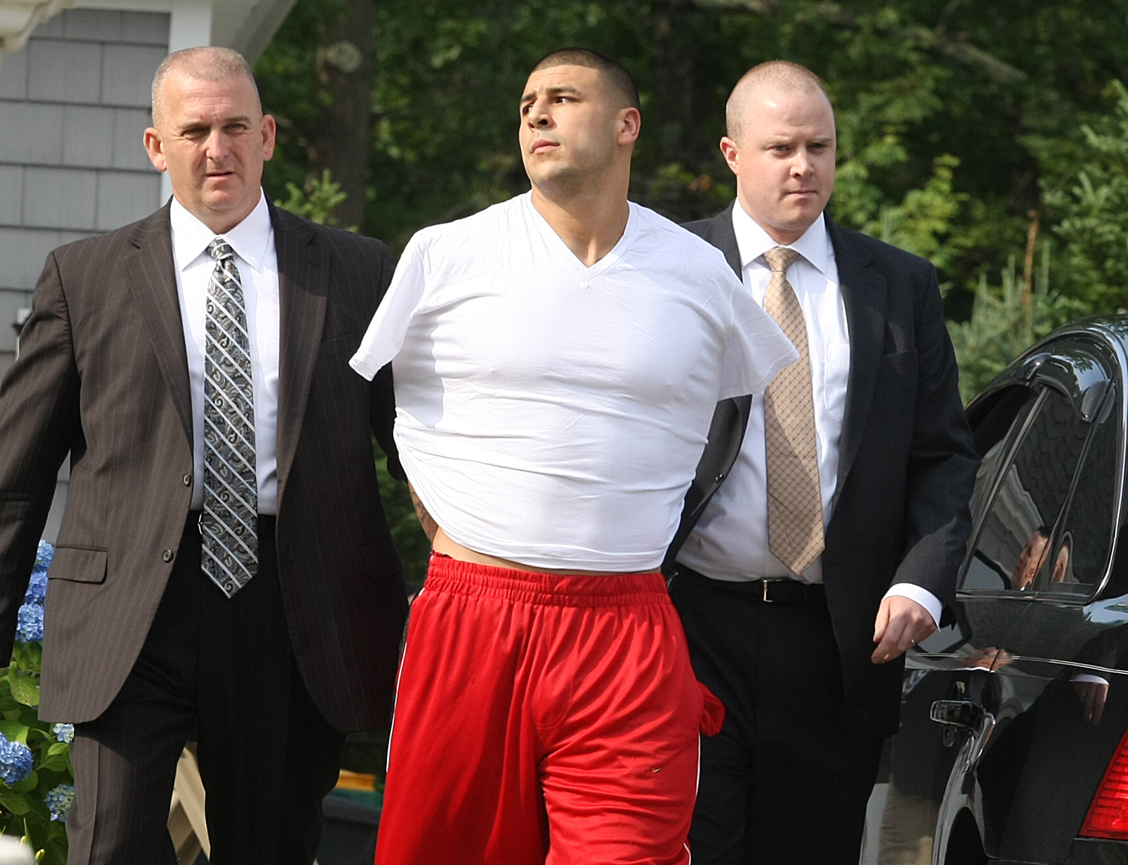 Goodbye to all that: Hernandez being arrested on June 25, 2013—his final day as a free man