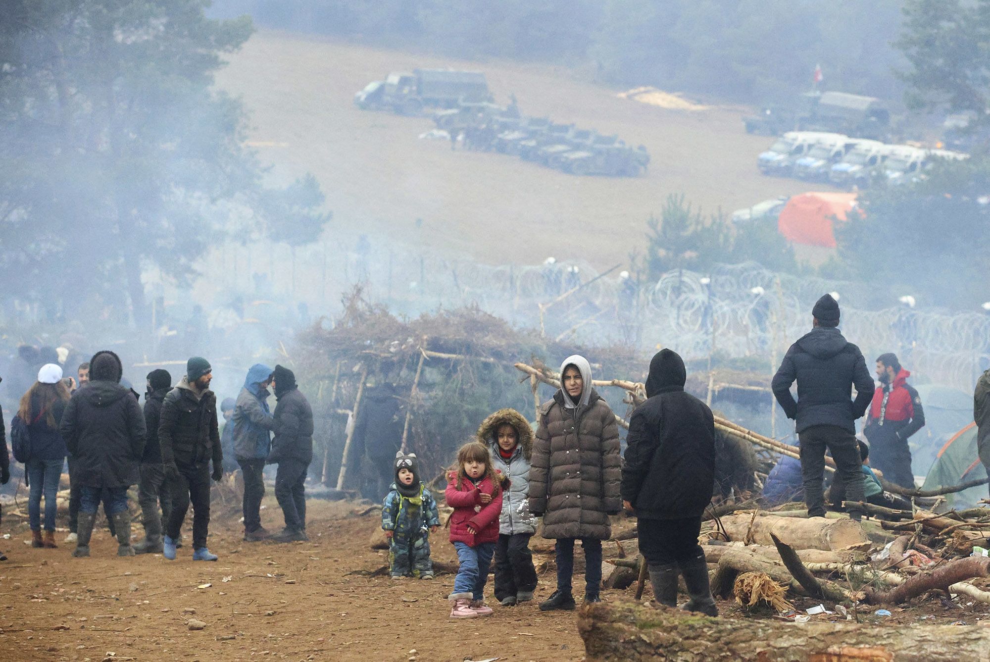 Putin Denies Stoking Migrant Crisis on Belarus-Poland Border