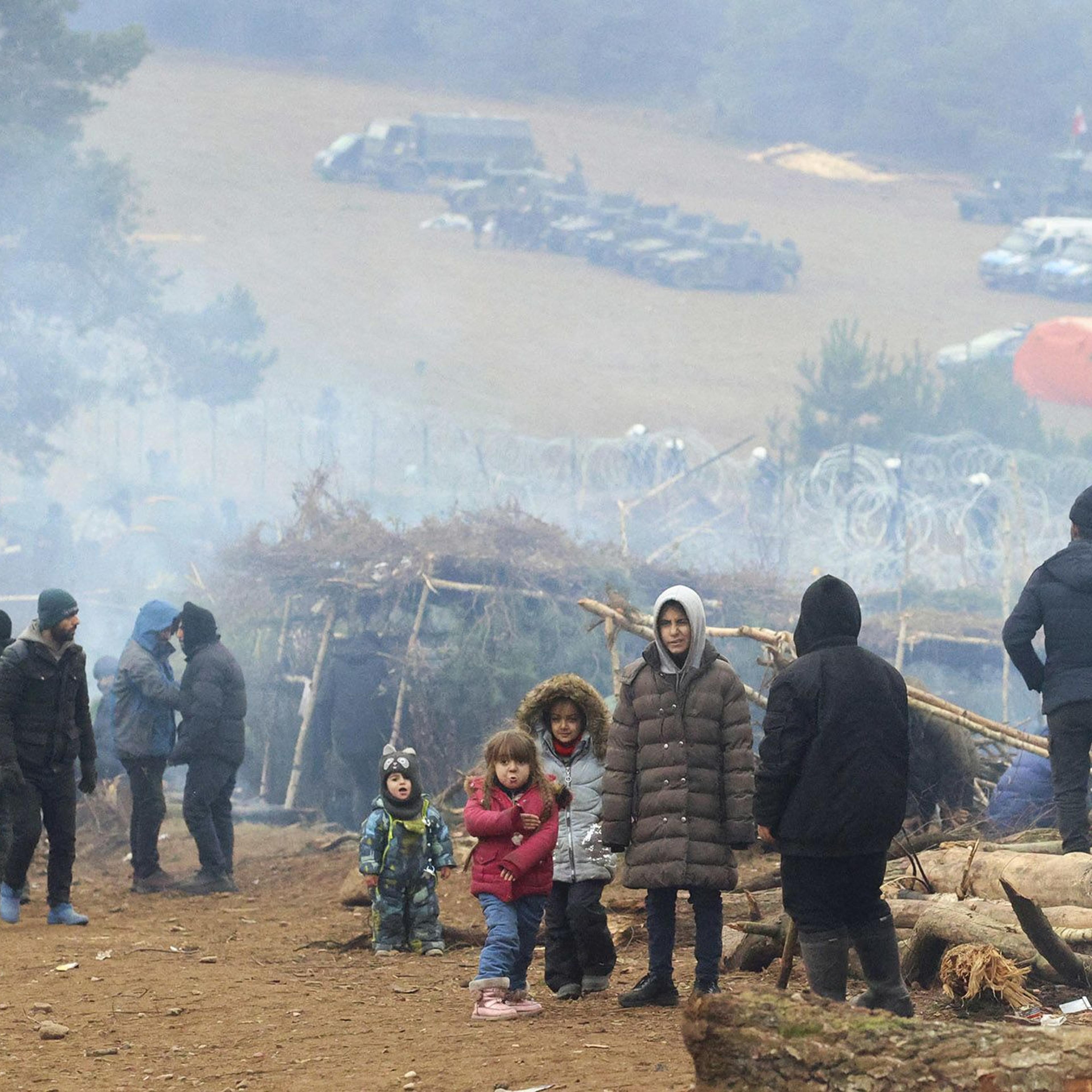Putin Denies Stoking Migrant Crisis on Belarus-Poland Border