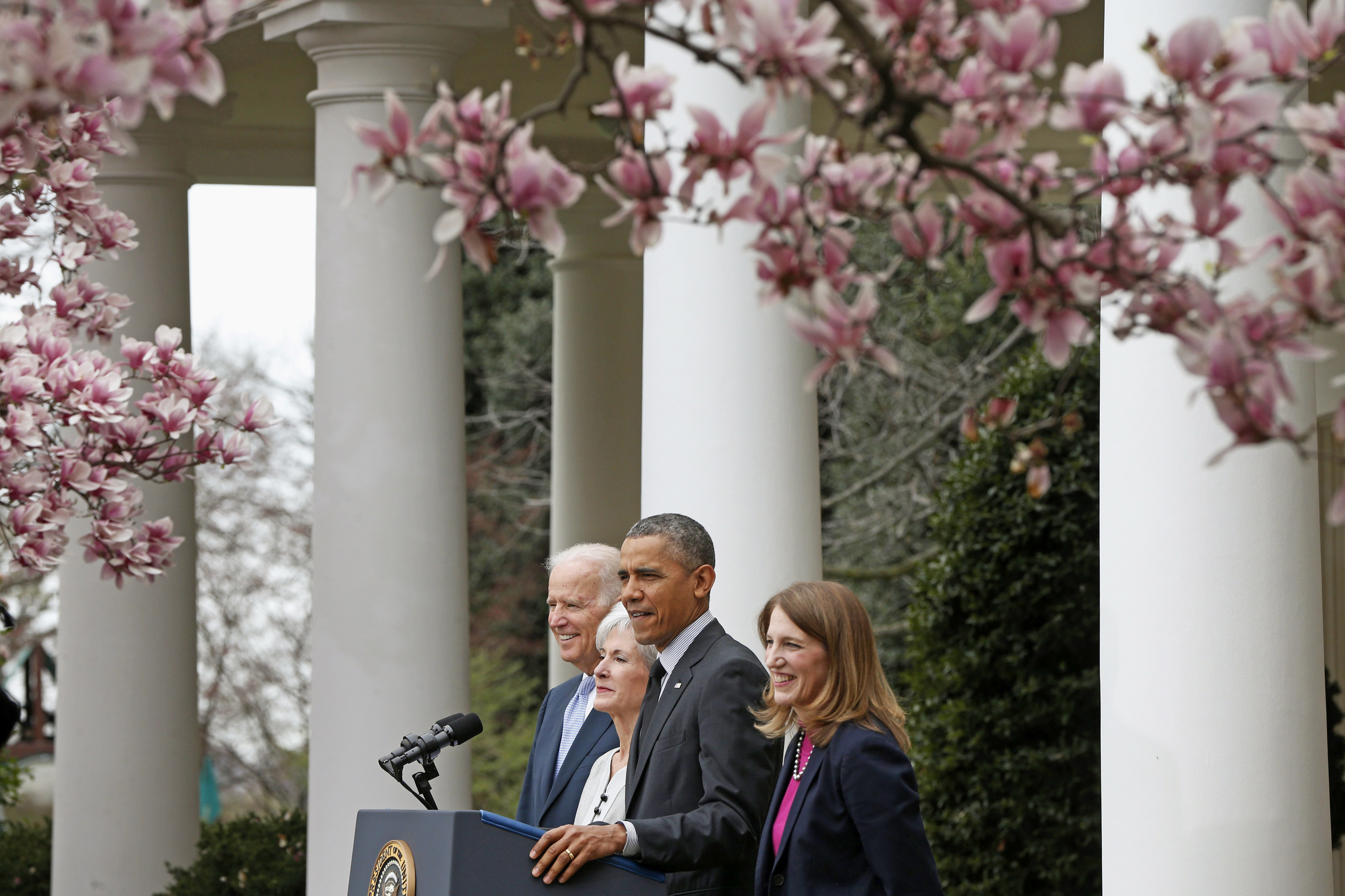 U.S. President Barack Obama and Vice President Joe Biden stand with outgoing Health and Human Services Secretary Kathleen Sebelius (second from left) and his nominee to be her replacement, Budget Director Sylvia Mathews Burwell in the Rose Garden of the 