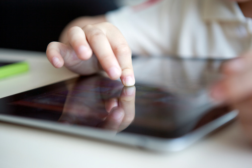 child-using-tablet