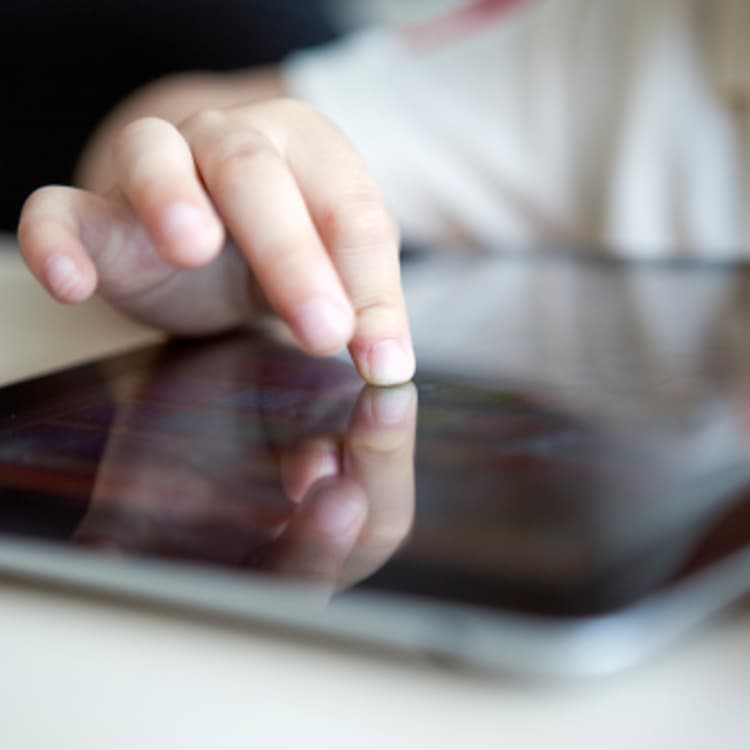 child-using-tablet