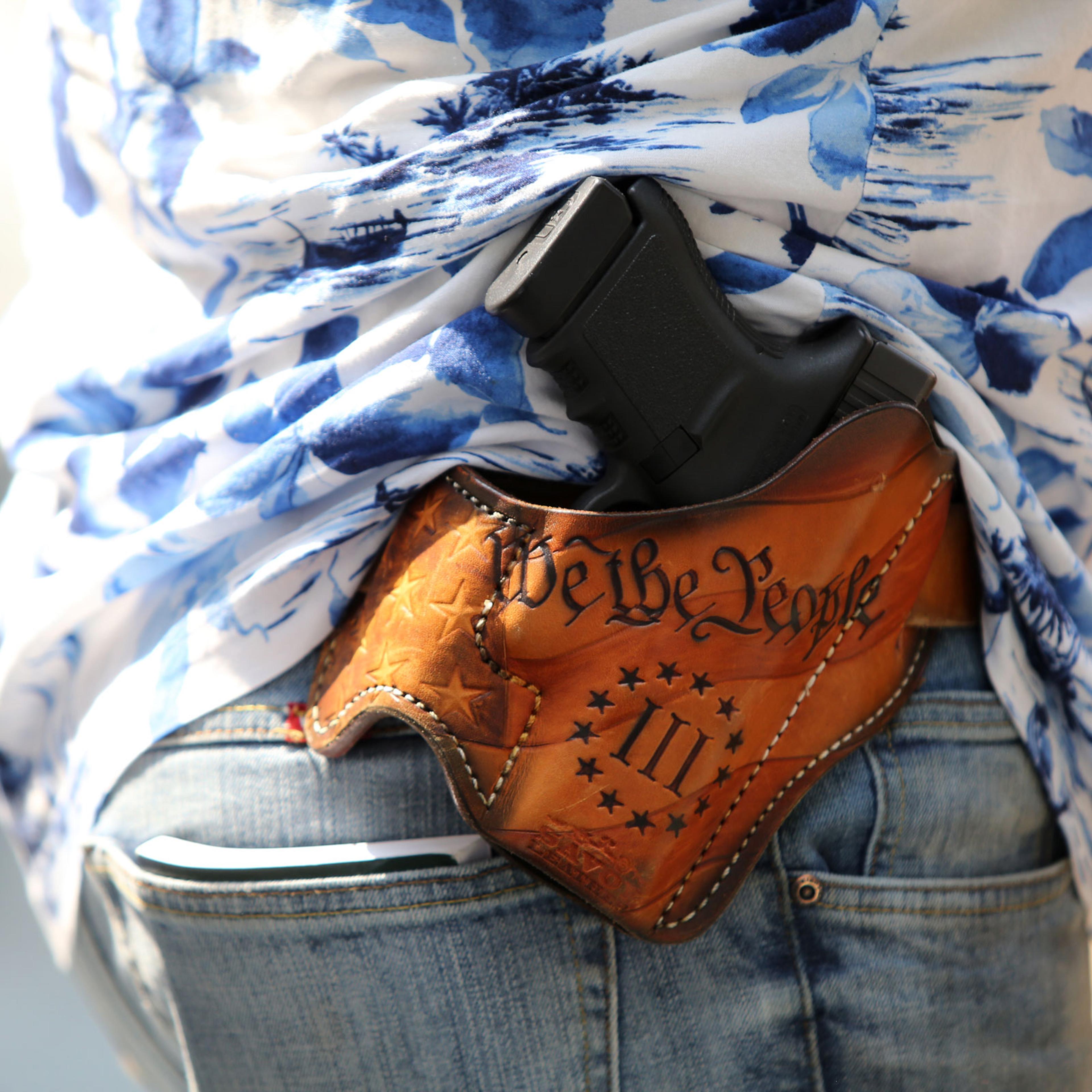 Detail of a holstered firearm of Matt Marshall, leader of the Washington 3%