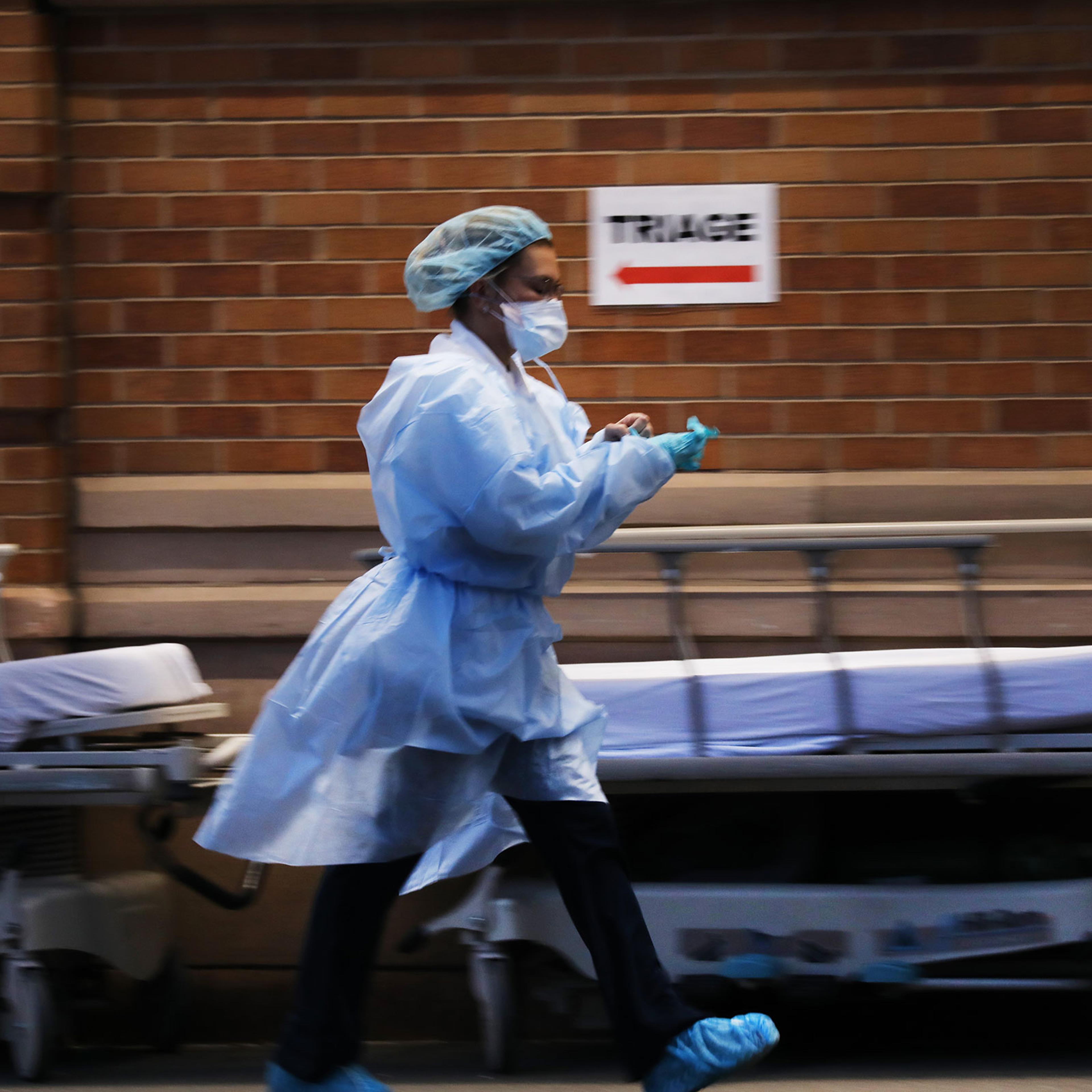 Medical workers wait for patients at a special coronavirus intake area at Maimonides Medical Center in the Borough Park section of Brooklyn