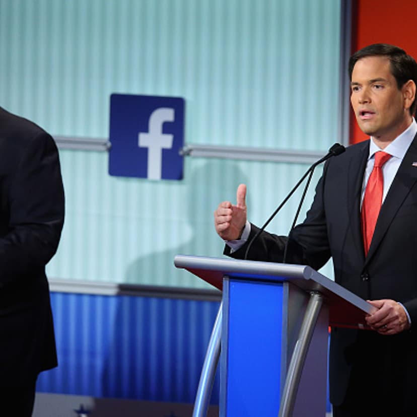 Republican presidential candidates New Jersey Gov. Chris Christie (L) and Sen. Marco Rubio (R-FL) participate in the first prime-time presidential debate hosted by FOX News and Facebook at the Quicken Loans Arena August 6, 2015 in Cleveland, Ohio.