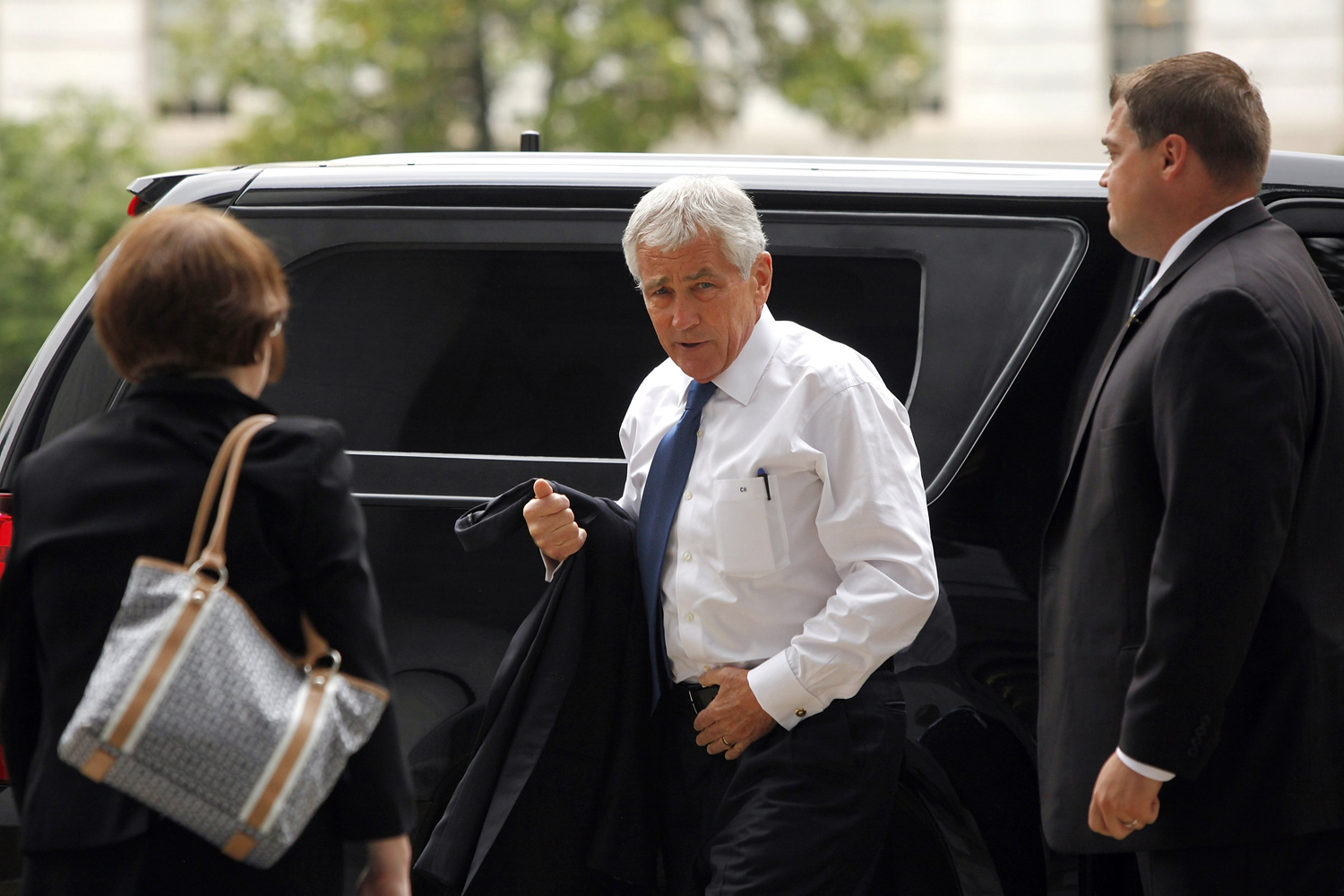 Defense Secretary Chuck Hagel arrives to testify about the Bergdahl prisoner exchange, at a House Armed Services Committee hearing on Capitol Hill in Washington June 11, 2014.