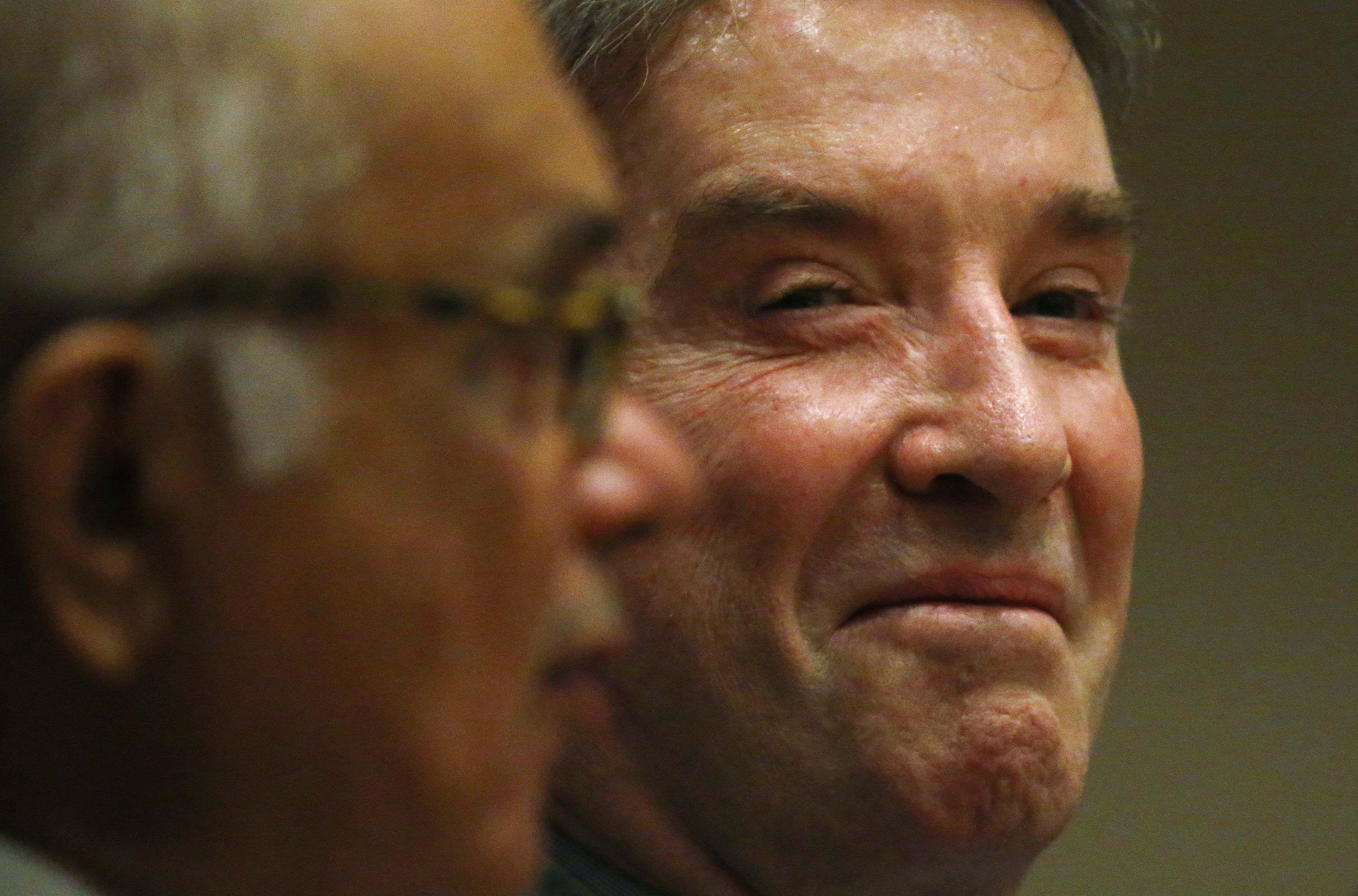 Brazilian tycoon Eike Batista attends his court hearing next his lawyer during testimonies in Rio de Janeiro