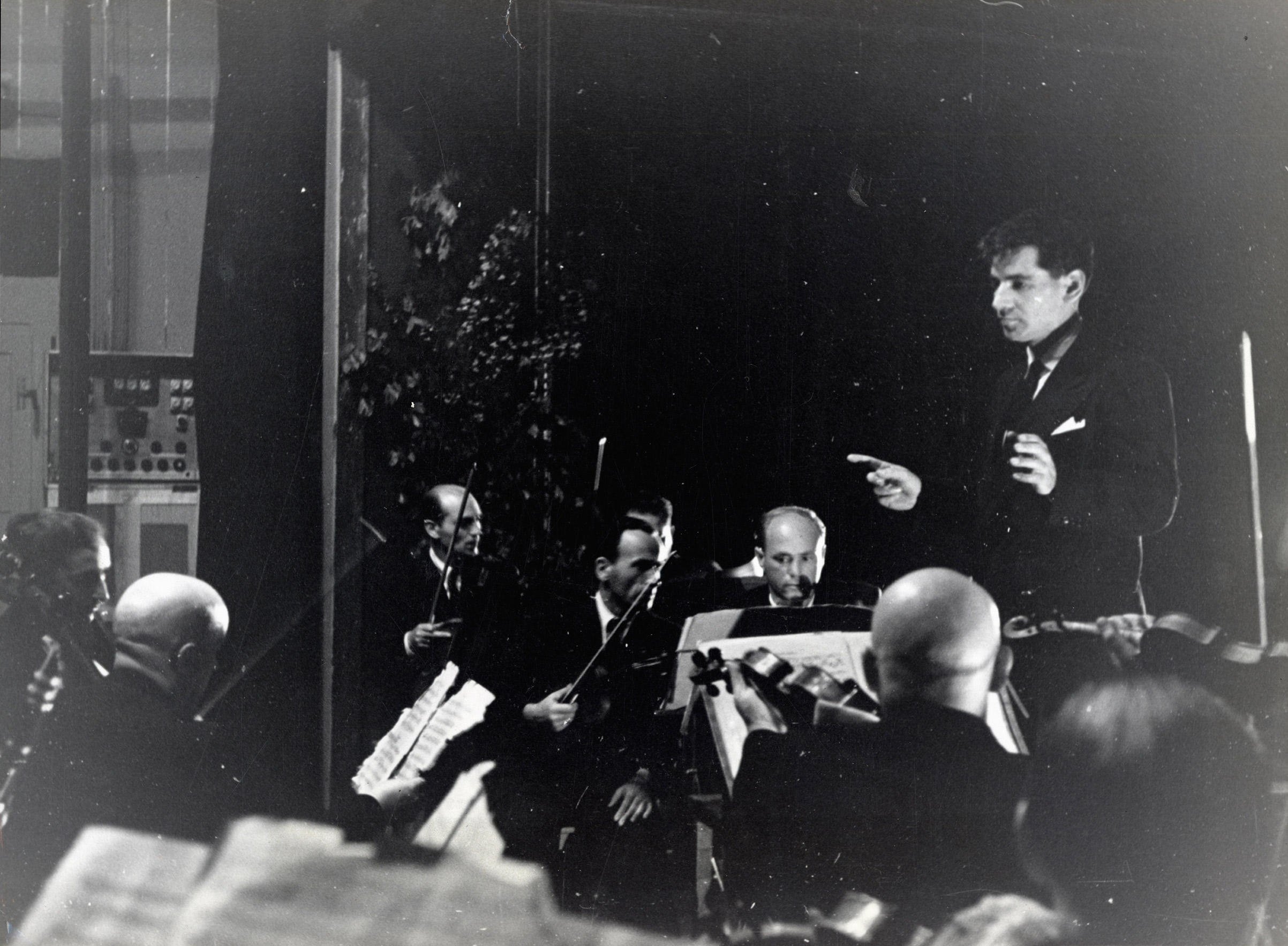 Leonard Bernstein conducting an orchestra of concentration camp survivors for a concert sponsored by the American Jewish Joint Distribution Committee on May 10, 1948, in Munich. 