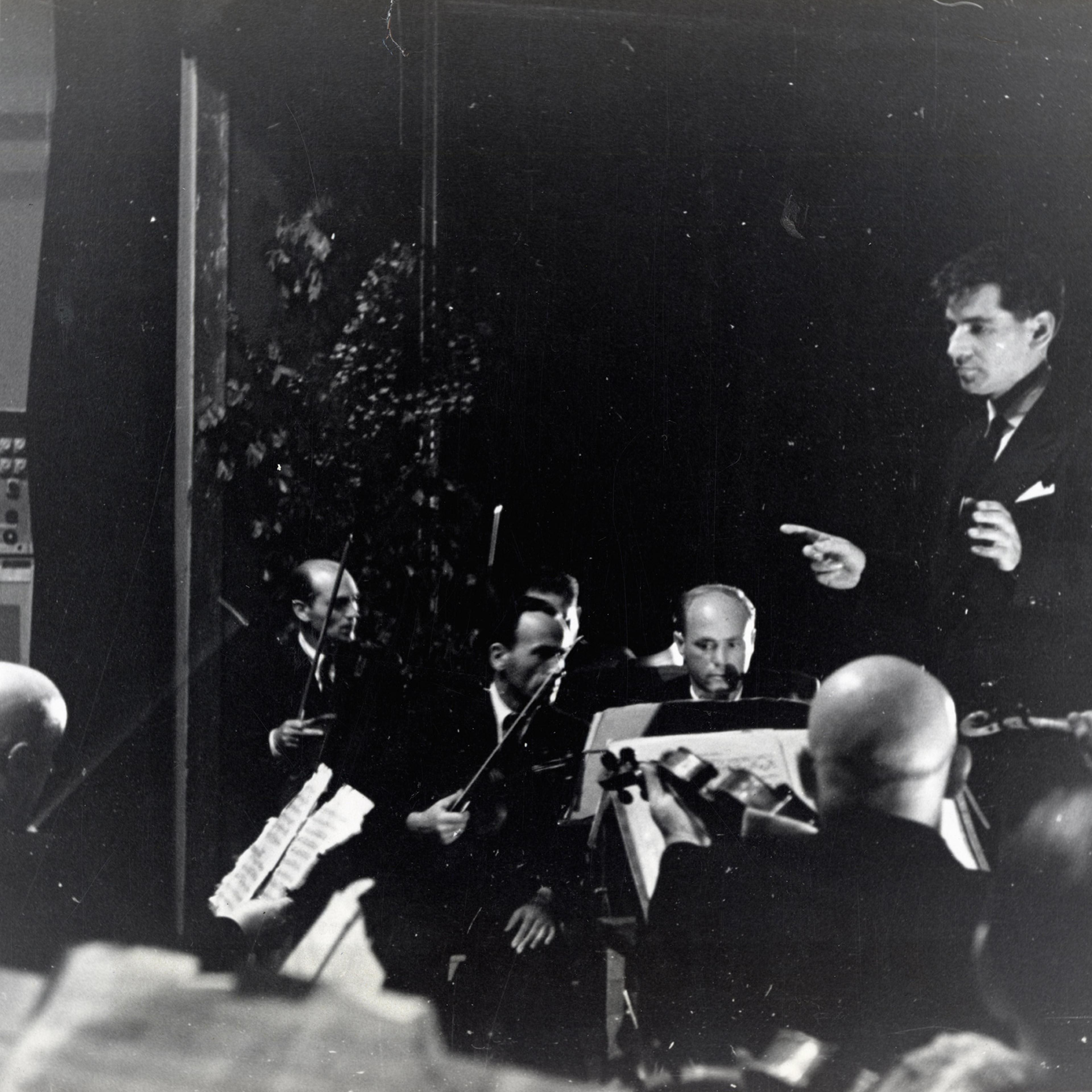 Leonard Bernstein conducting an orchestra of concentration camp survivors for a concert sponsored by the American Jewish Joint Distribution Committee on May 10, 1948, in Munich.