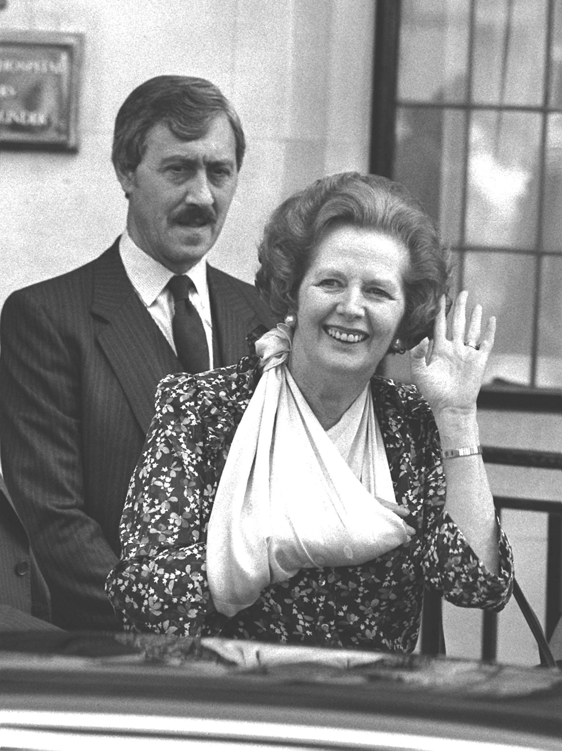 Thatcher leaving hospital.
