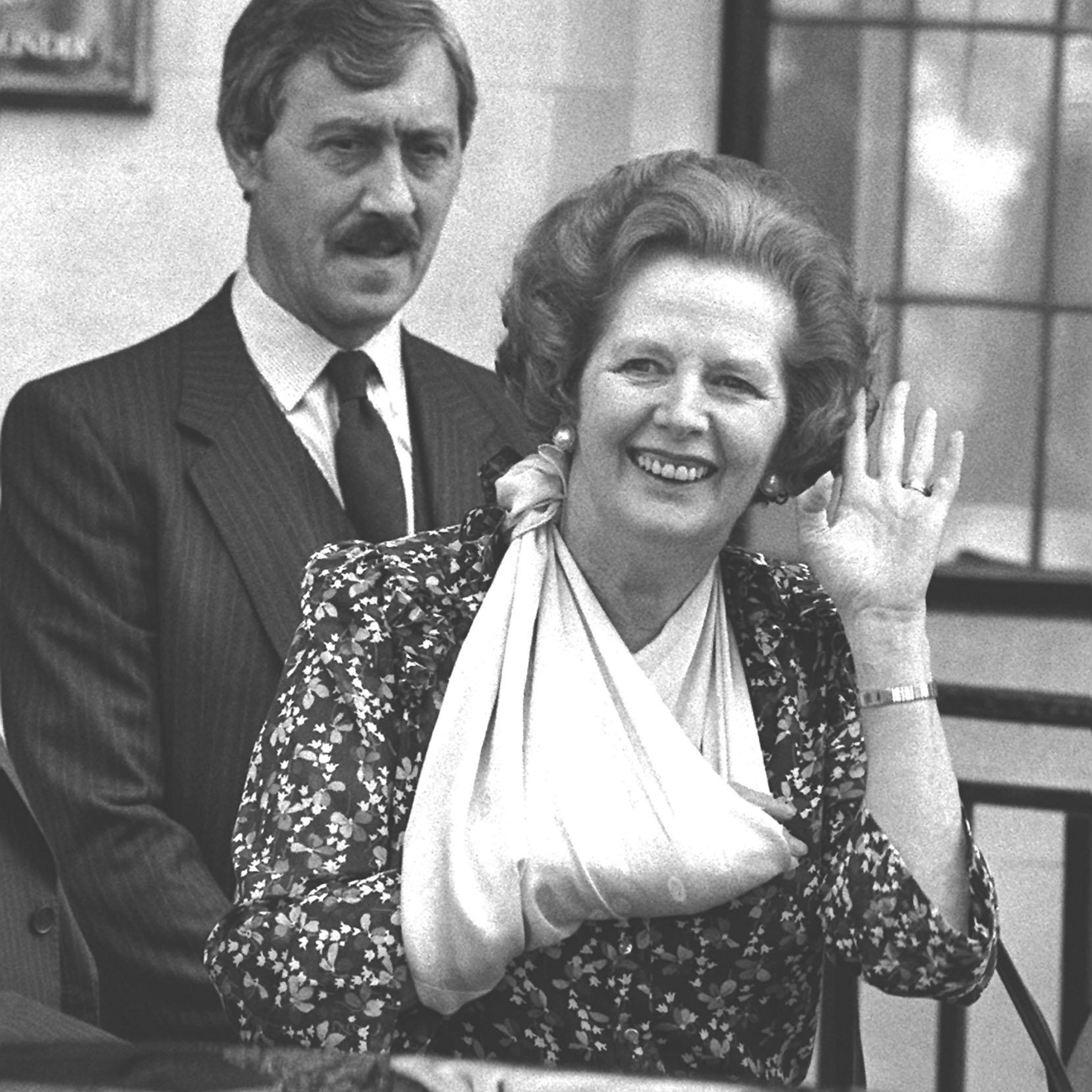 Thatcher leaving hospital.