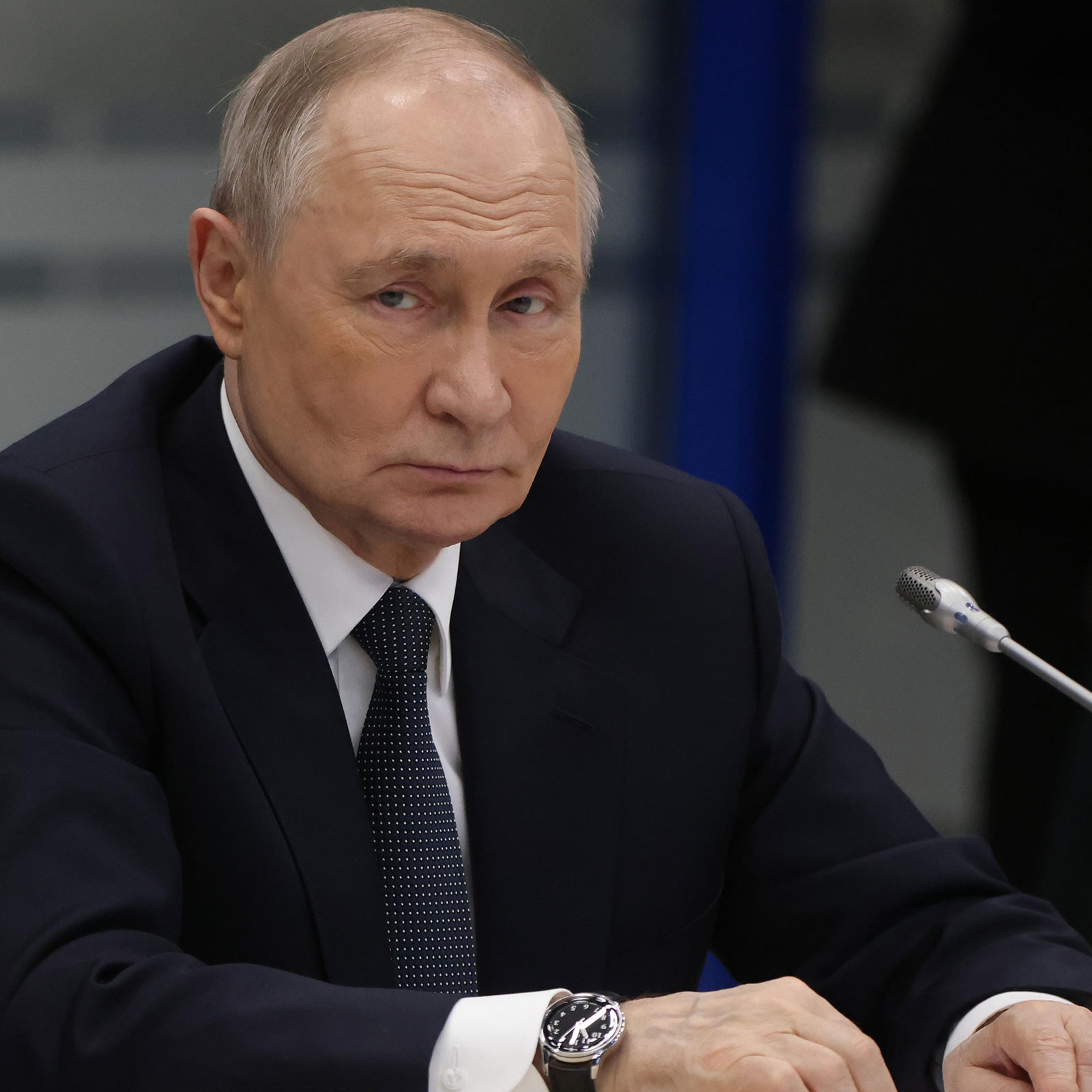Russian President Vladimir Putin looks on, whilst visiting a military base of the nuclear fleet in Murmansk, Russia on March 26, 2025.