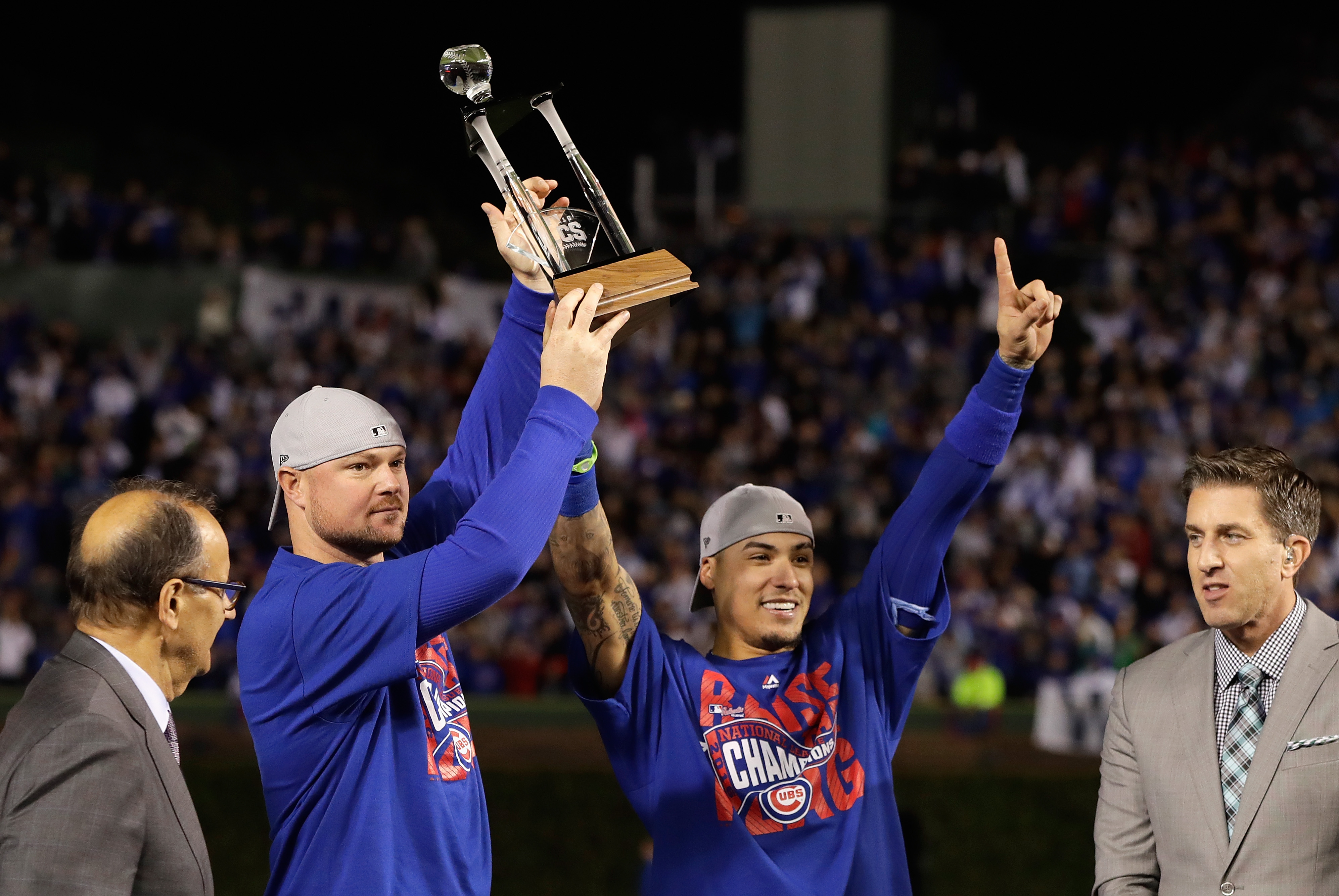 The co-MVPs of the NLCS, Jon Lester (left) and Javier Baez of the Chicago Cubs, pose after Chicago defeated the Los Angeles Dodgers 5-0 in game six of the NLCS Series to advance to the World Series.