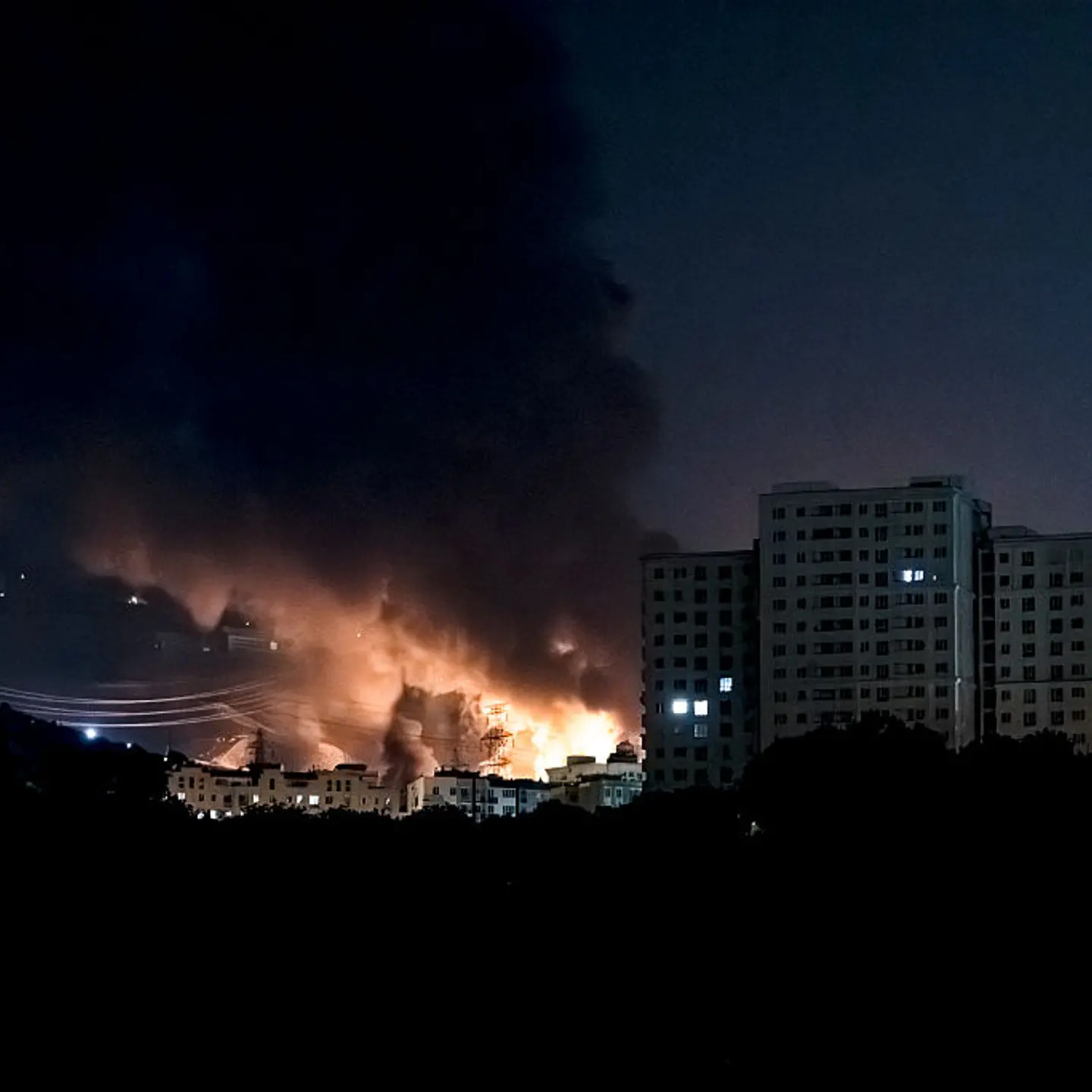 Smoke rises from locations targeted in Tehran on the third day of Israel's waves of strikes against Iran, on June 15, 2025.