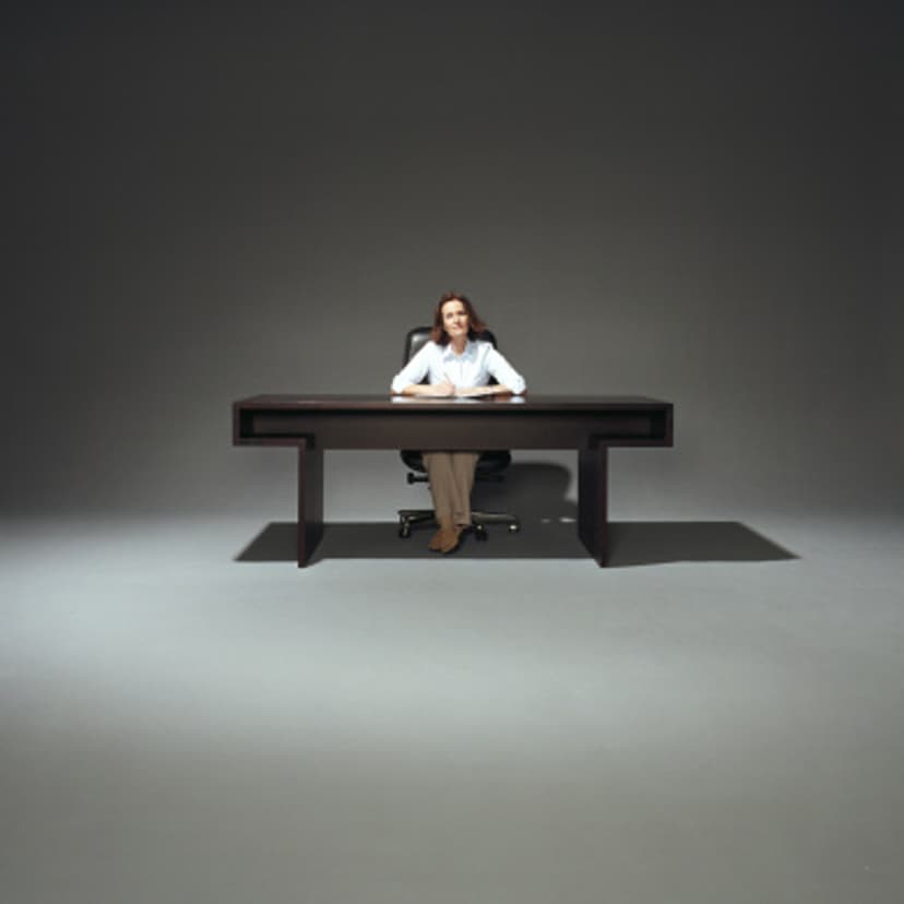 businesswoman-sitting-desk