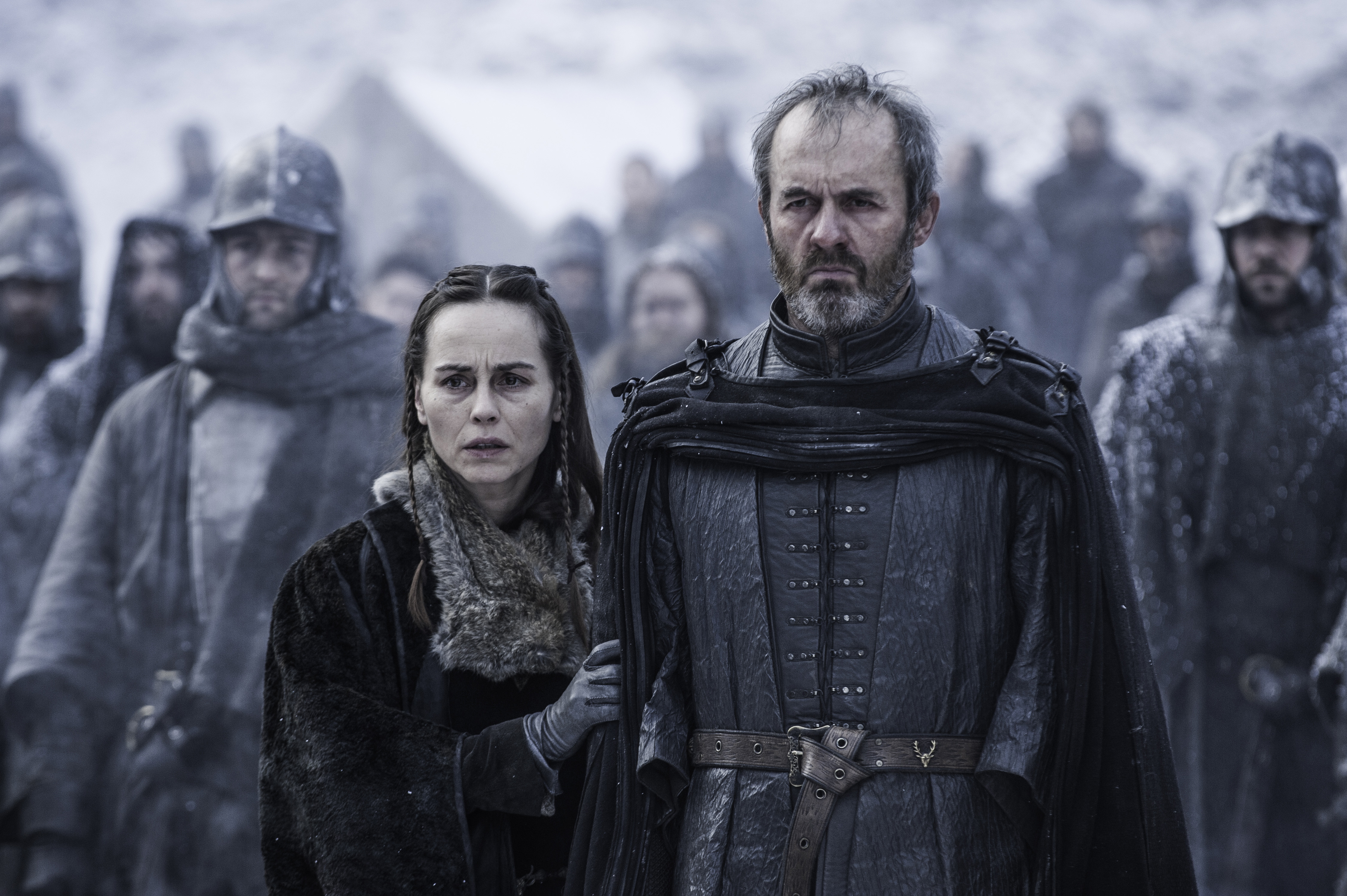Selyse and Stannis Baratheon watch their daughter Shireen burn as a sacrifice in Game of Thrones.
