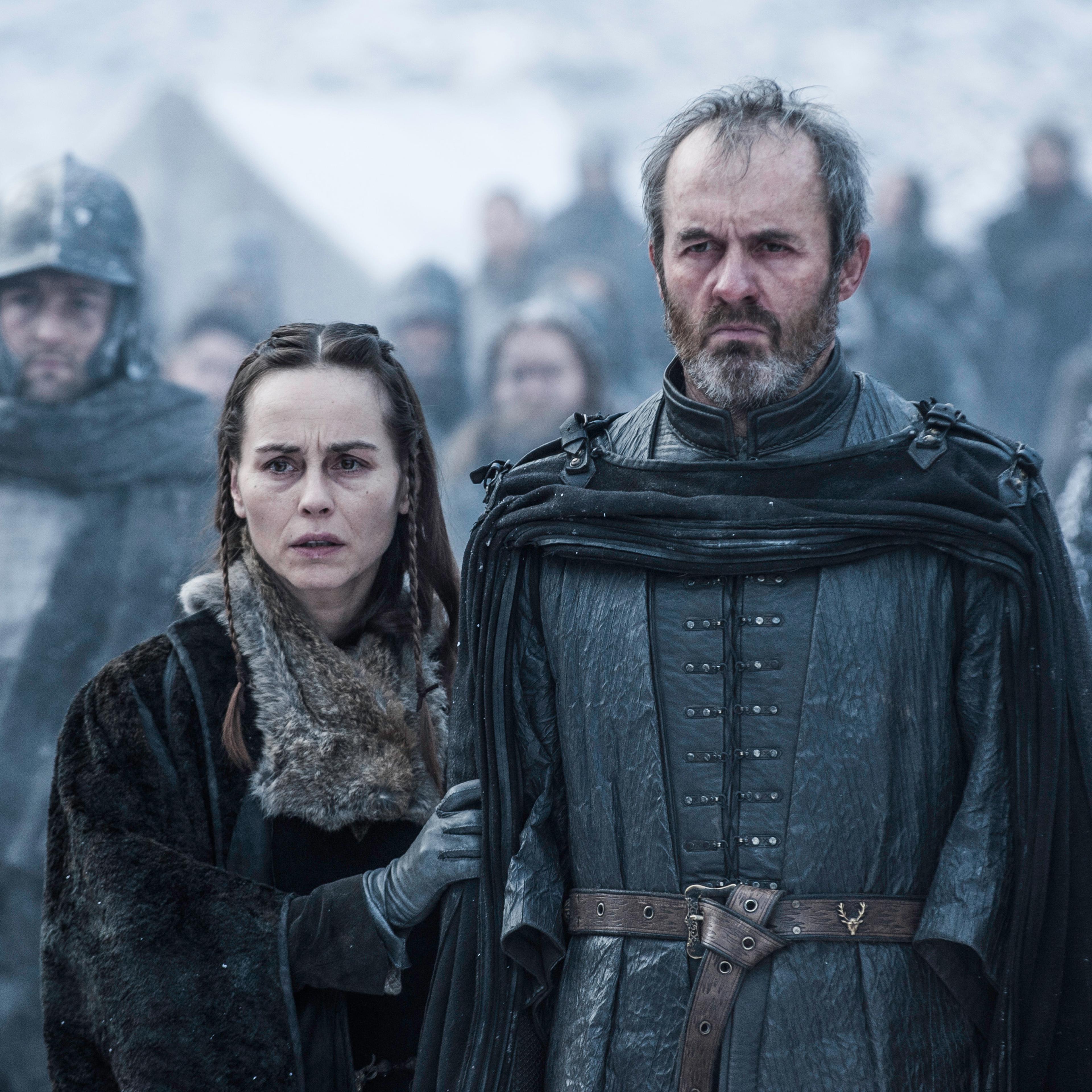 Selyse and Stannis Baratheon watch their daughter Shireen burn as a sacrifice in Game of Thrones.