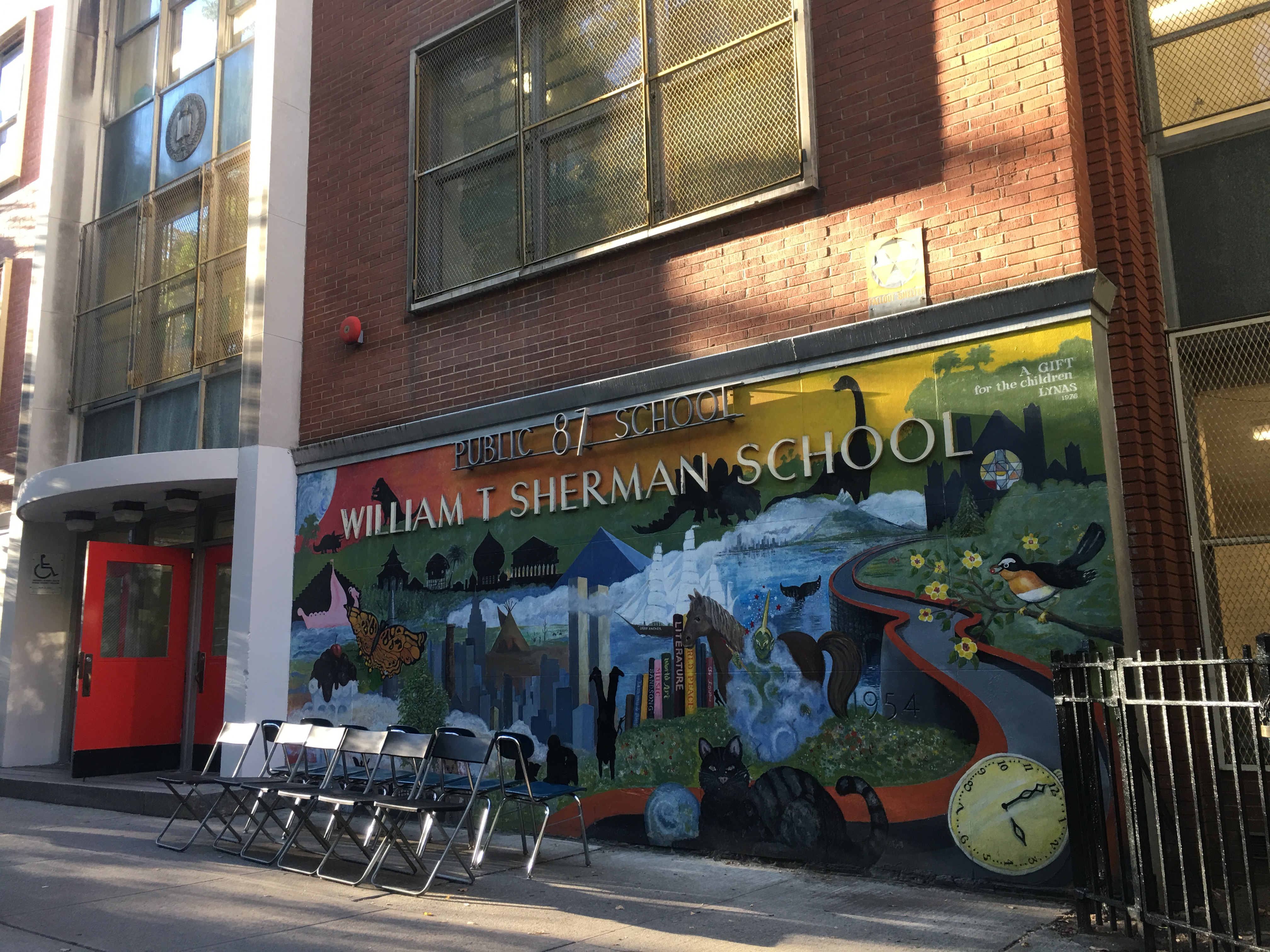 New York City's PS 87, with chairs set out for picture day, has a well-off parent body that is seeking to spread the wealth. 