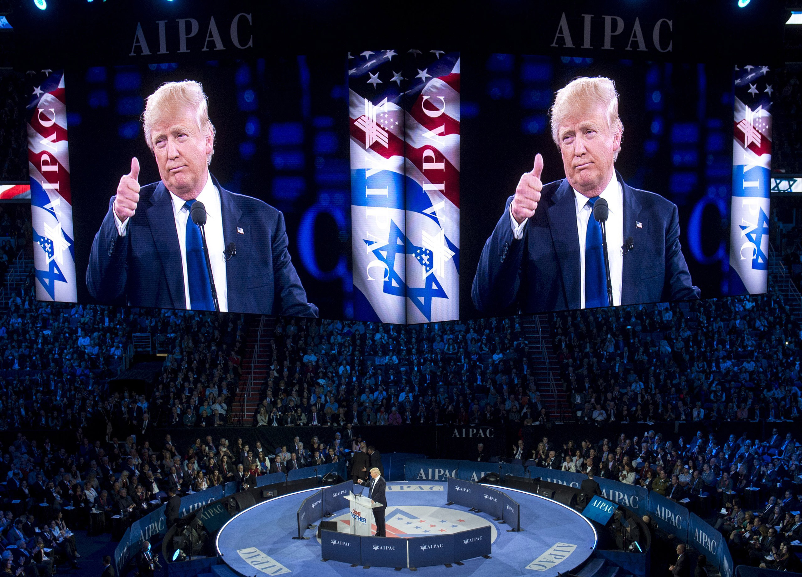 US Republican presidential hopeful Donald Trump gives a thumbs-up as he addresses the American Israel Public Affairs Committee (AIPAC) 2016 Policy Conference at the Verizon Center in Washington, DC, March 21, 2016. / AFP PHOTO / SAUL LOEBSAUL LOEB/AFP/Ge