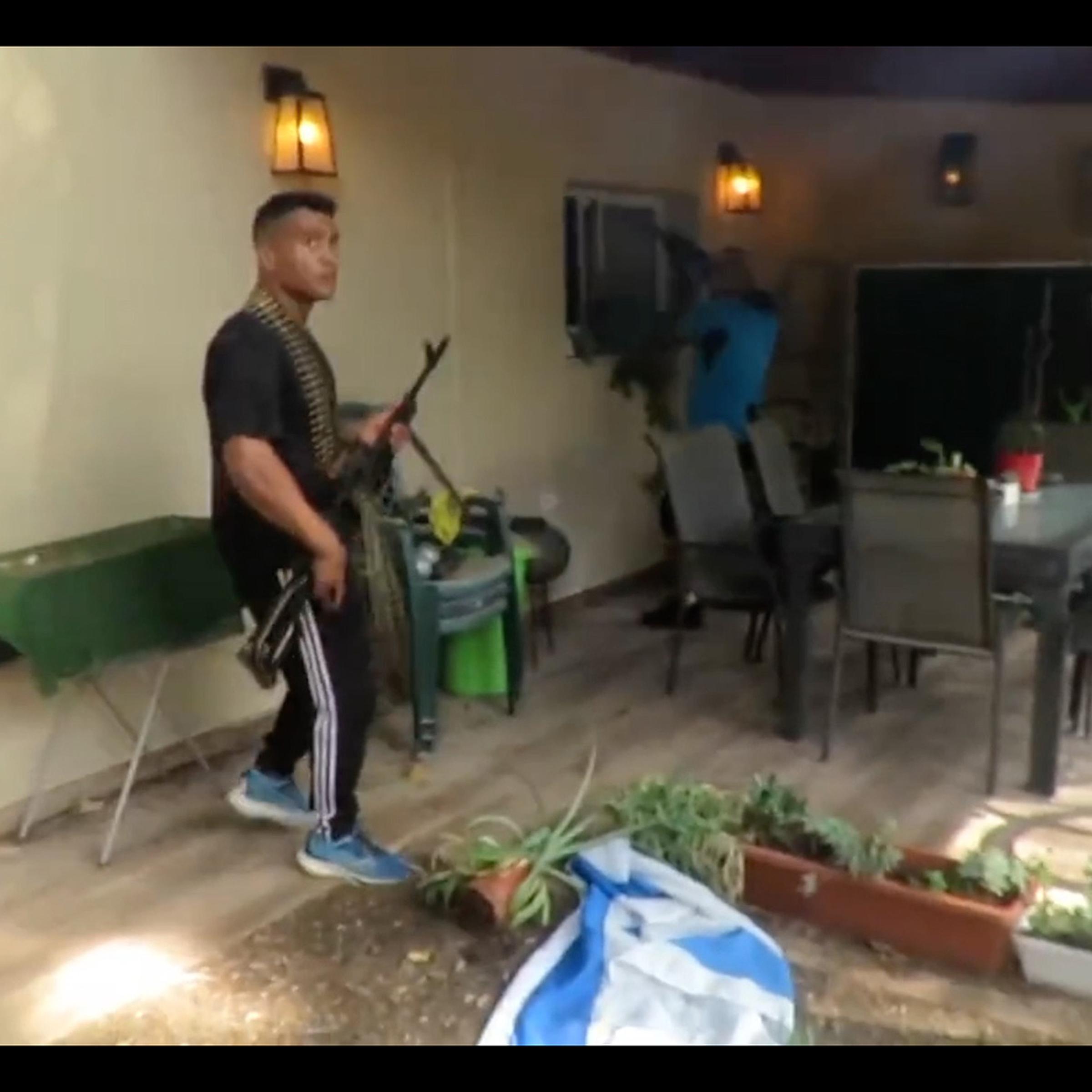 A video still from recovered Hamas body camera footage shows their infiltration into southern Israel from Gaza on Oct 7, 2023.
