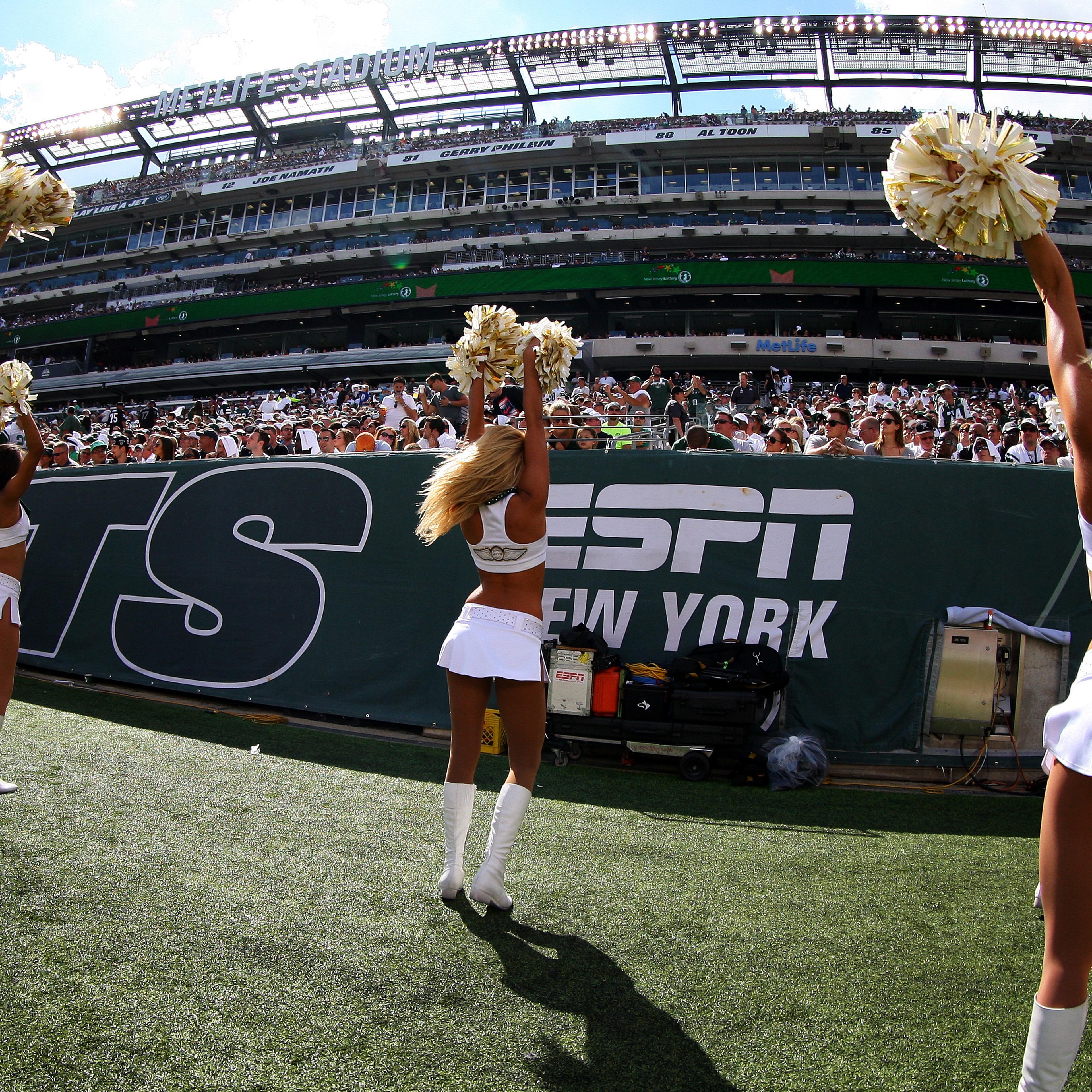 The New York Jets Flight Crew cheerleaders perform during the fourth quarter of a game between the New York Jets and the Oakland Raiders at MetLife Stadium on Sept. 7, 2014 in East Rutherford, New Jersey.
