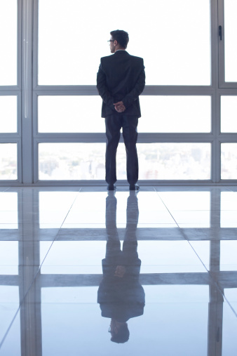 businessman-thinking-window