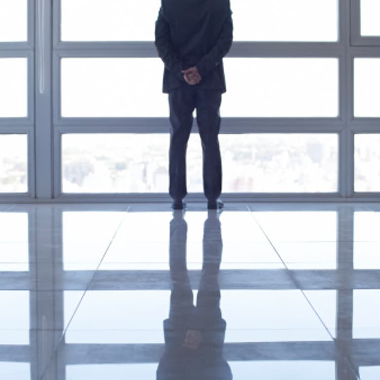 businessman-thinking-window