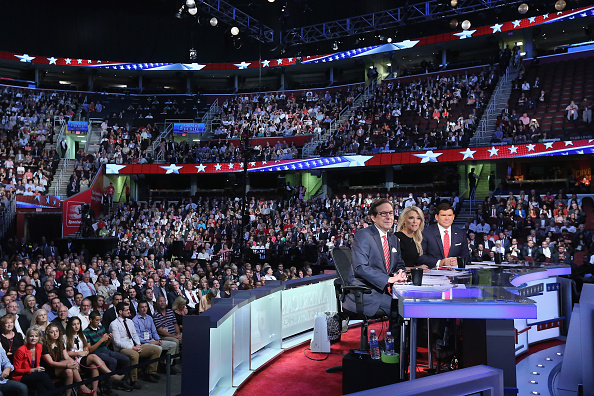 FOX News anchors (L-R) Chris Wallace, Megan Kelly and Bret Baier prepare to moderate the first prime-time Republican presidential debate hosted at the Quicken Loans Arena August 6, 2015 in Cleveland, Ohio.