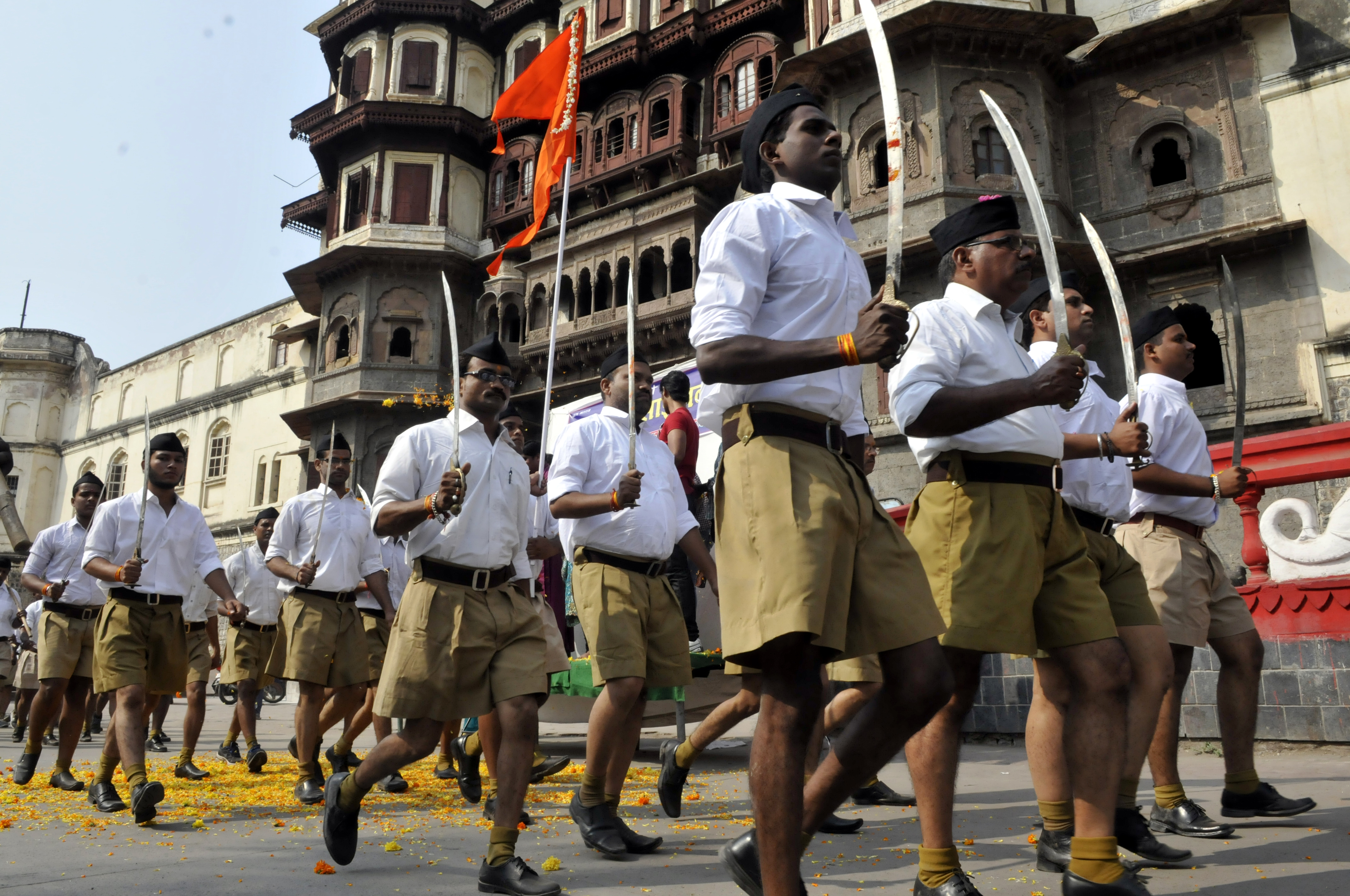 RSS volunteers queue up for an annual march at Jehangirabad area in Indore, India, on Oct. 22, 2015