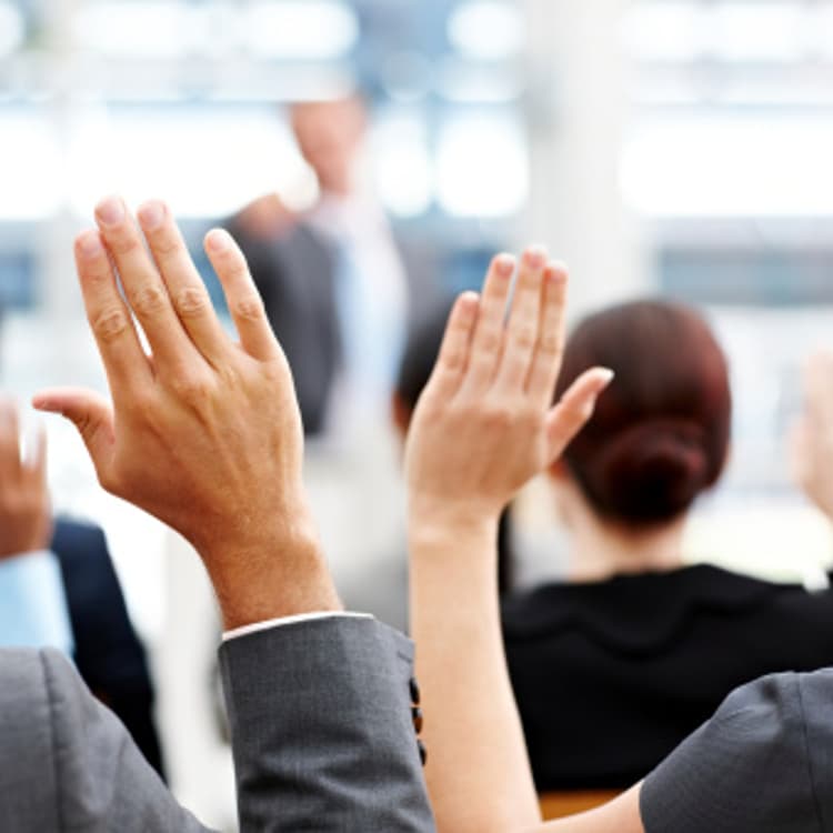 business-people-raising-hands