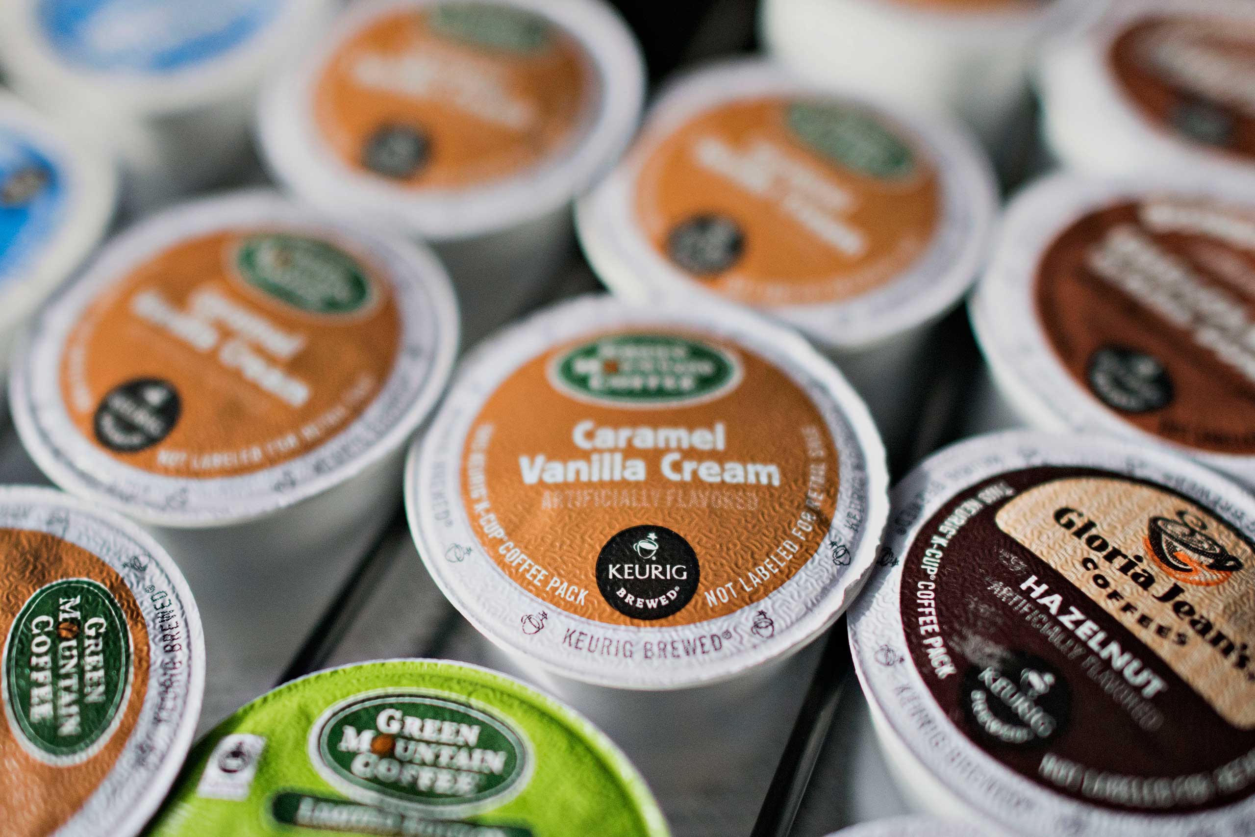 A tray of Keurig Green Mountain Inc. K-Cup coffee packs is arranged for a photograph at a salon in Princeton, Ill., Feb. 3, 2015.