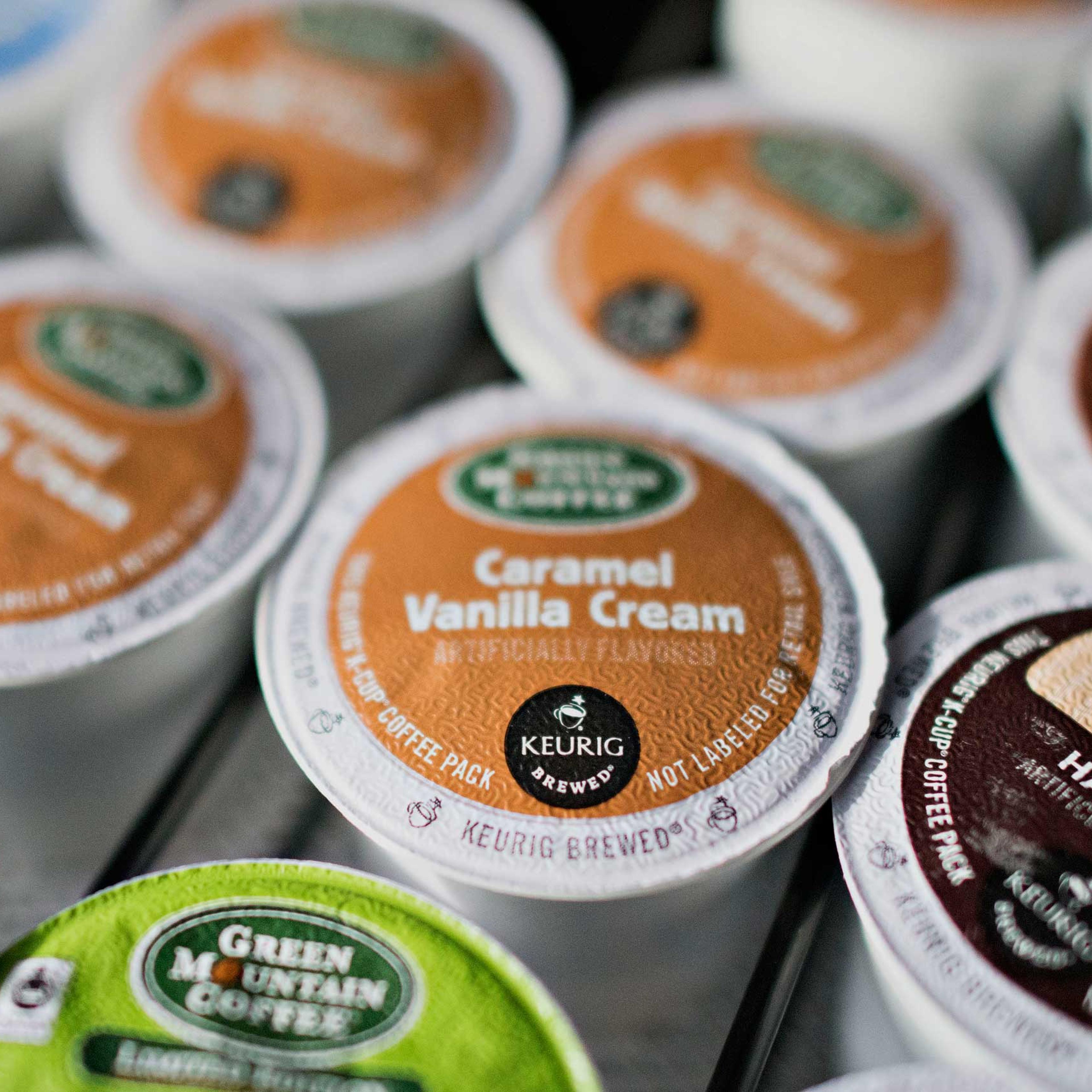 A tray of Keurig Green Mountain Inc. K-Cup coffee packs is arranged for a photograph at a salon in Princeton, Ill., Feb. 3, 2015.