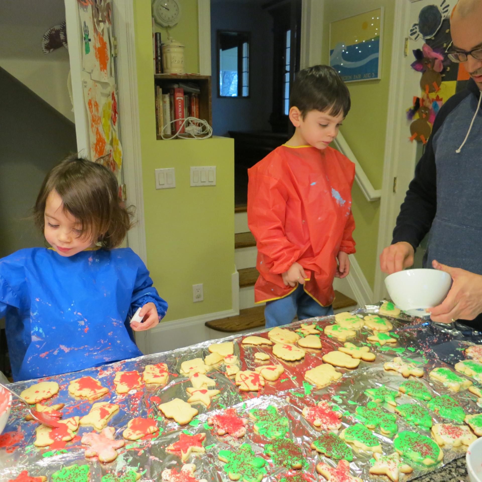 The author bakes cookies with his 3-year-old twins