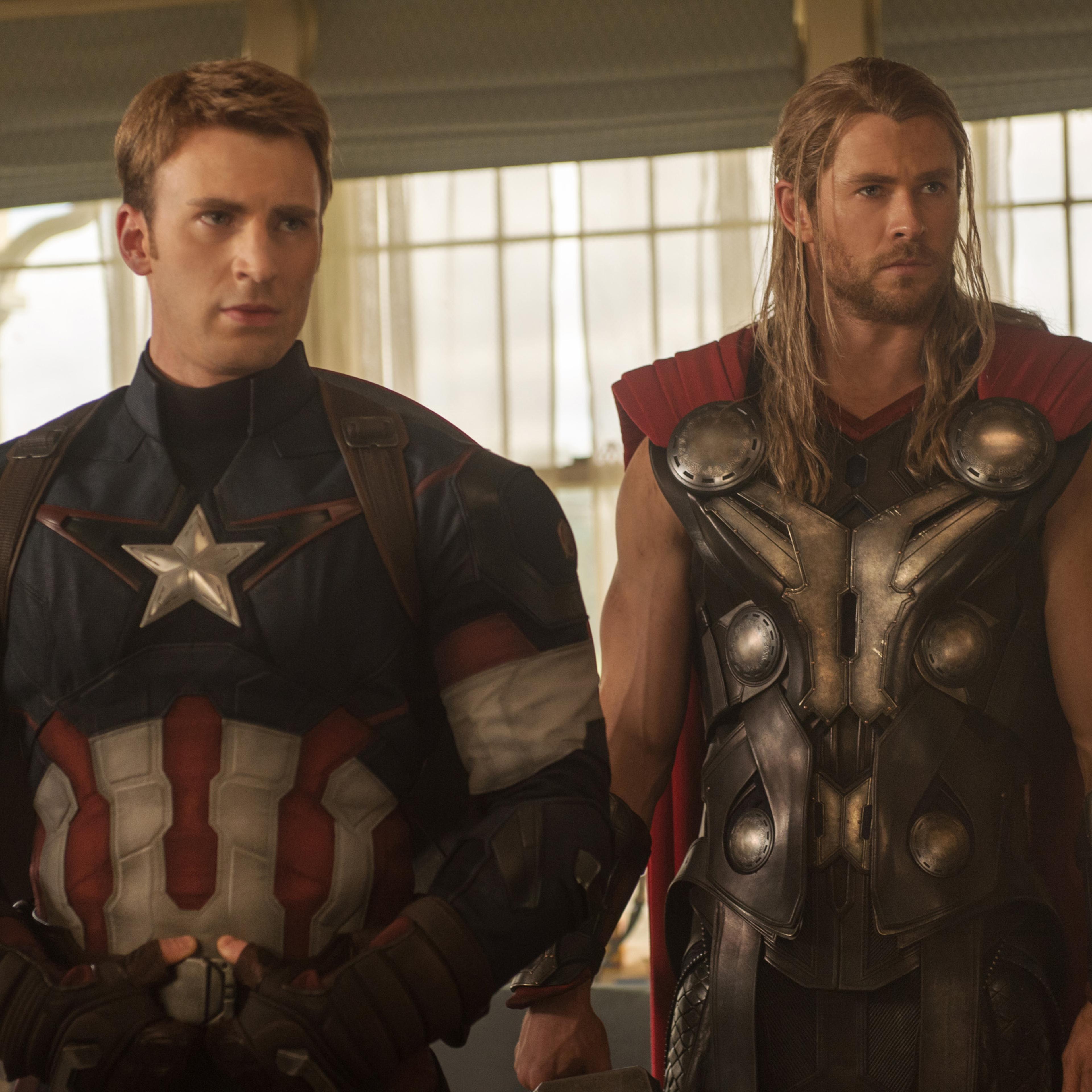 This photo provided by Disney/Marvel shows, Chris Evans, left, as Captain America/Steve Rogers, and Chris Hemsworth as Thor, in the new film, "Avengers: Age Of Ultron."