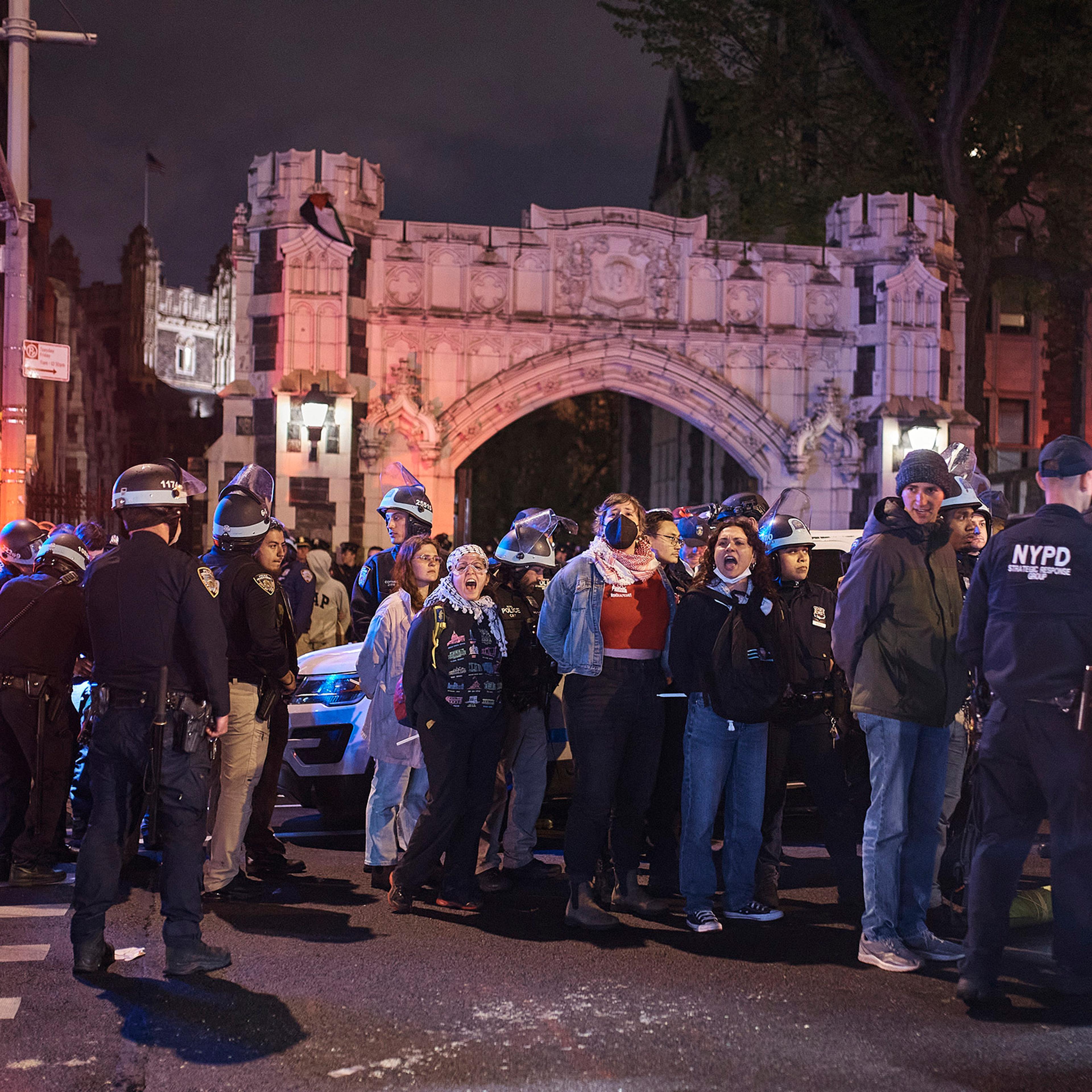 Police load arrested protestors onto buses in front of the CUNY City College of New York in New York City, on May 1, 2024.