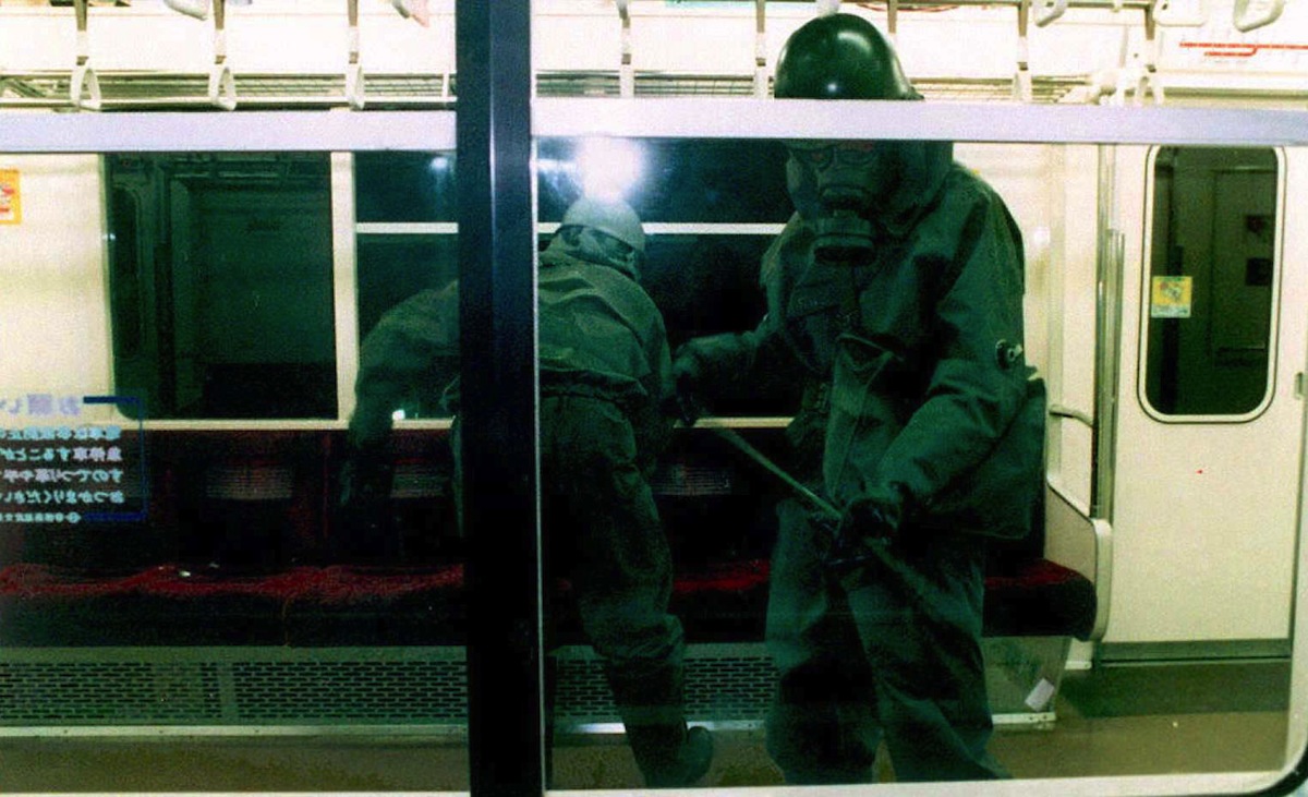 Wearing gas masks, members of the Japan