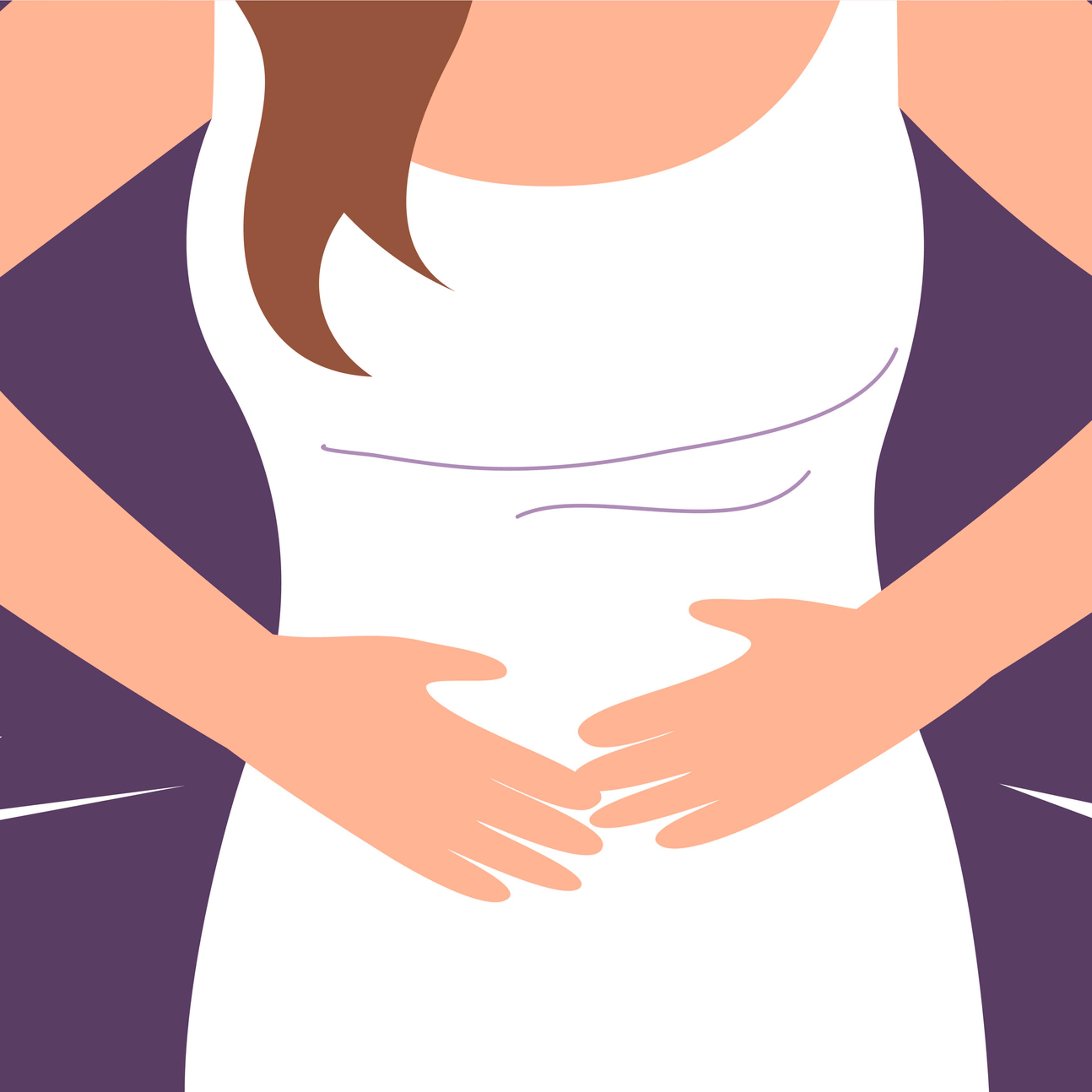 A young woman suffers from abdominal pain