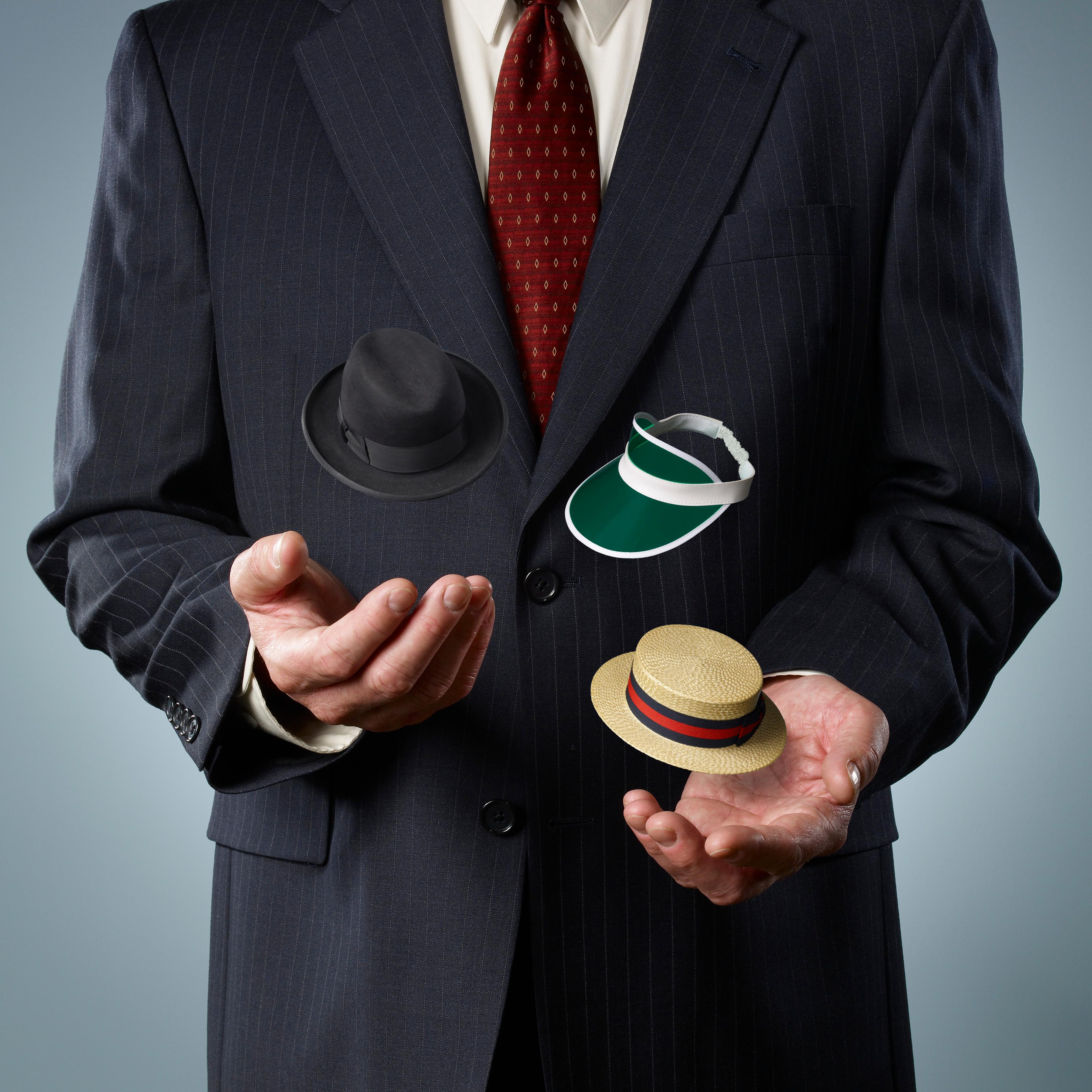 businessman-juggling-hats