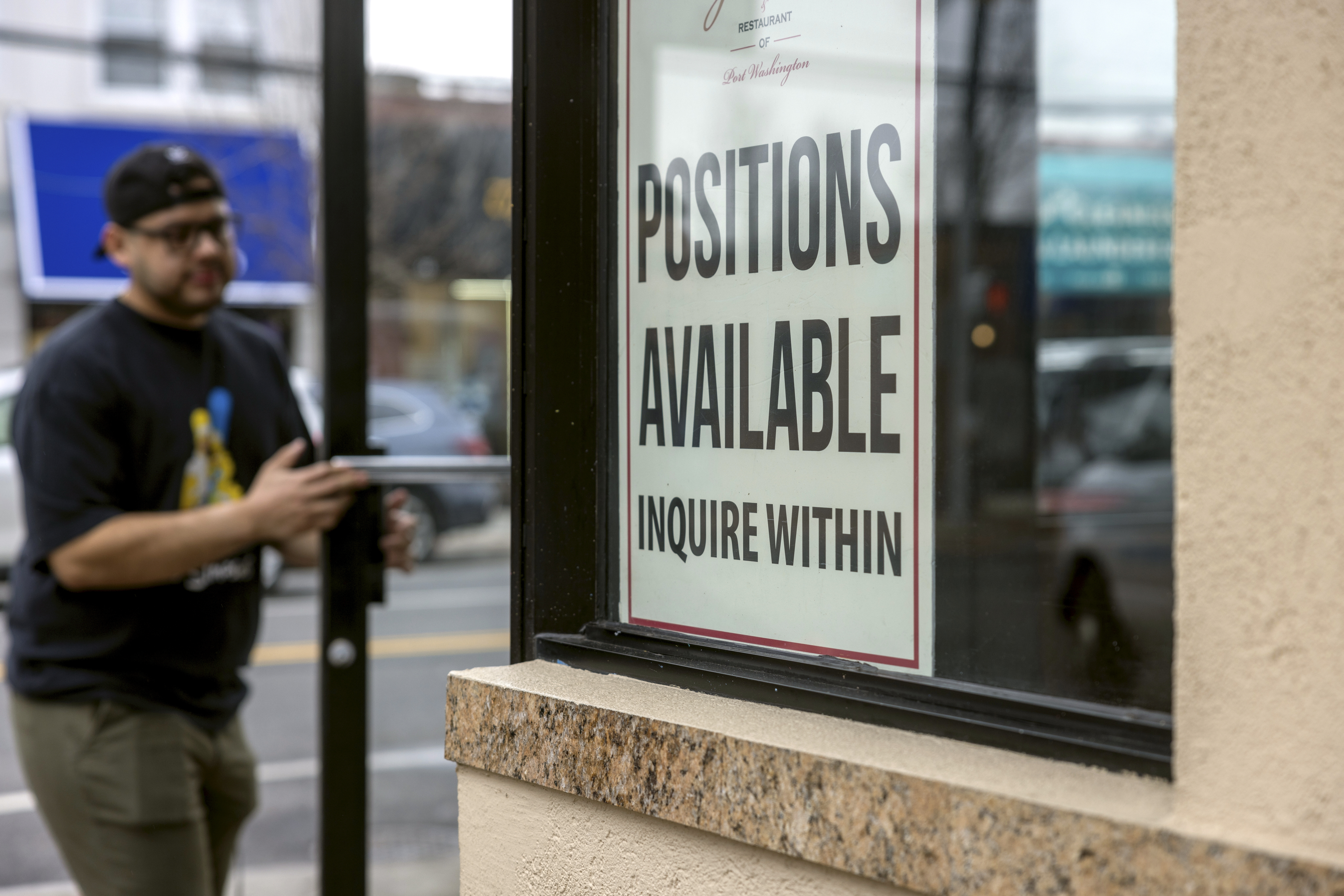 Help Wanted sign on a Long Island pizzeria