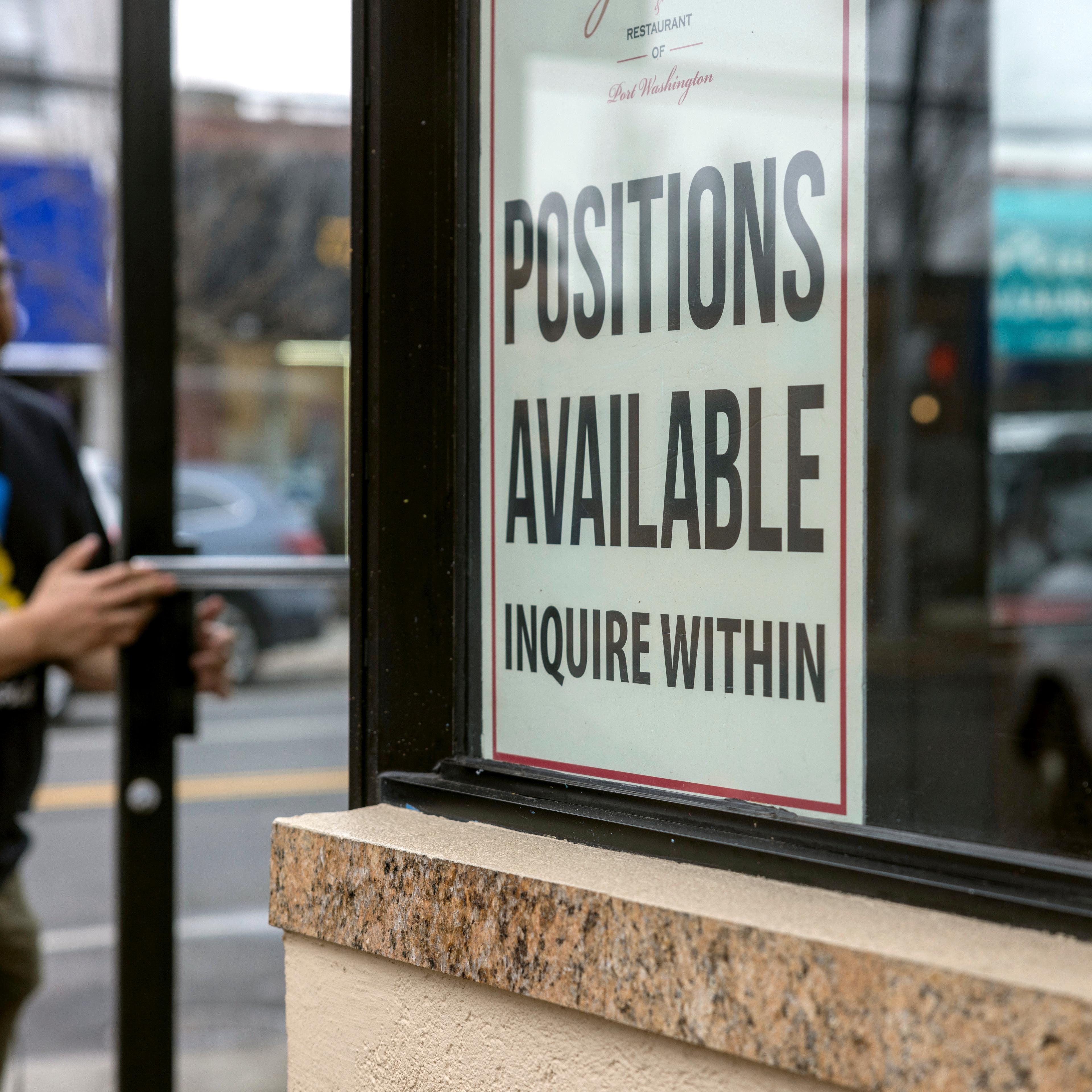 Help Wanted sign on a Long Island pizzeria