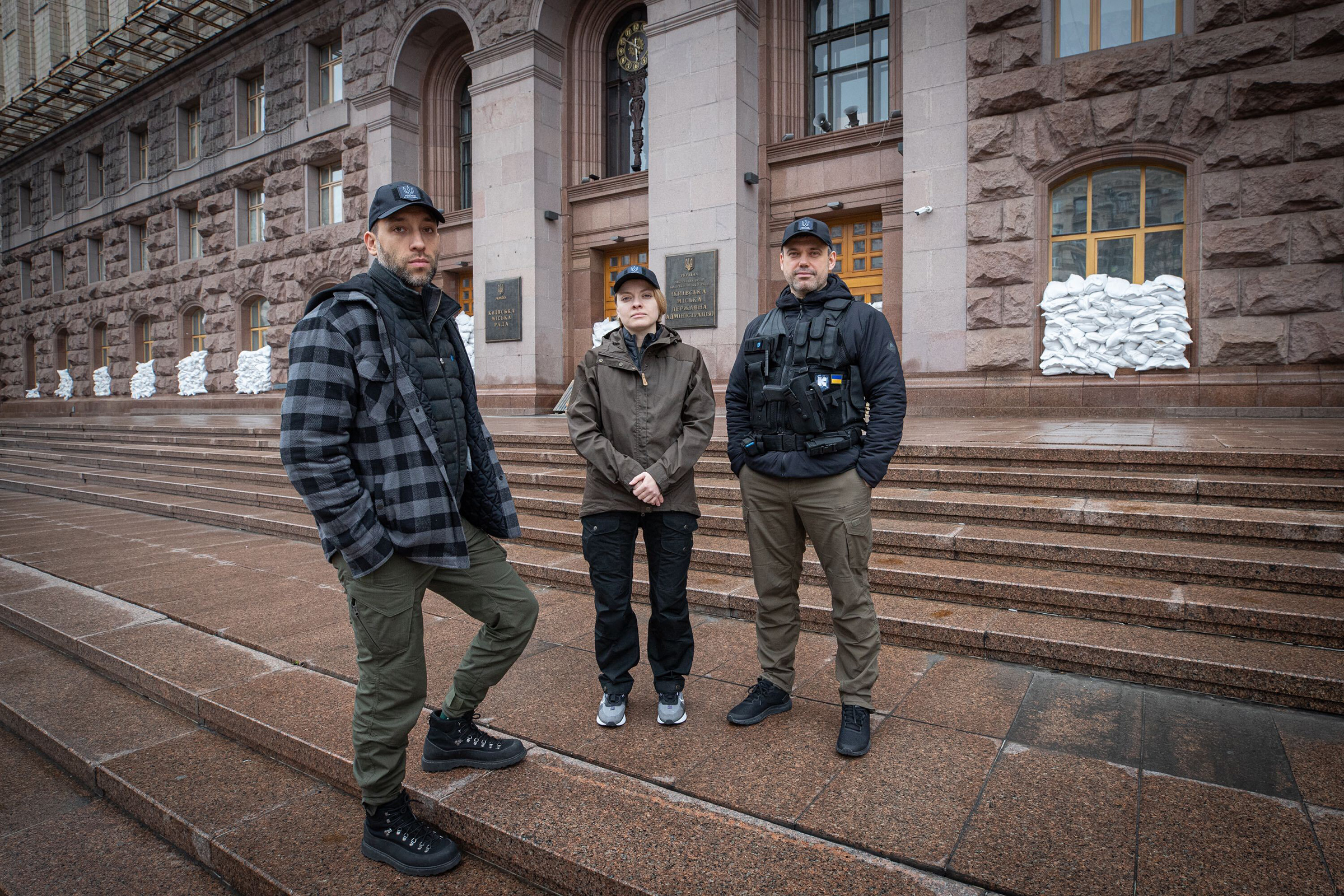 From left, Kyiv Director of IT Oleg Polovynko, Deputy IT Director Victoria Itskovich, and Kyiv Deputy Mayor and Chief Digital Transformation Officer Petro Olenych outside Kyiv’s city administration building on April 1