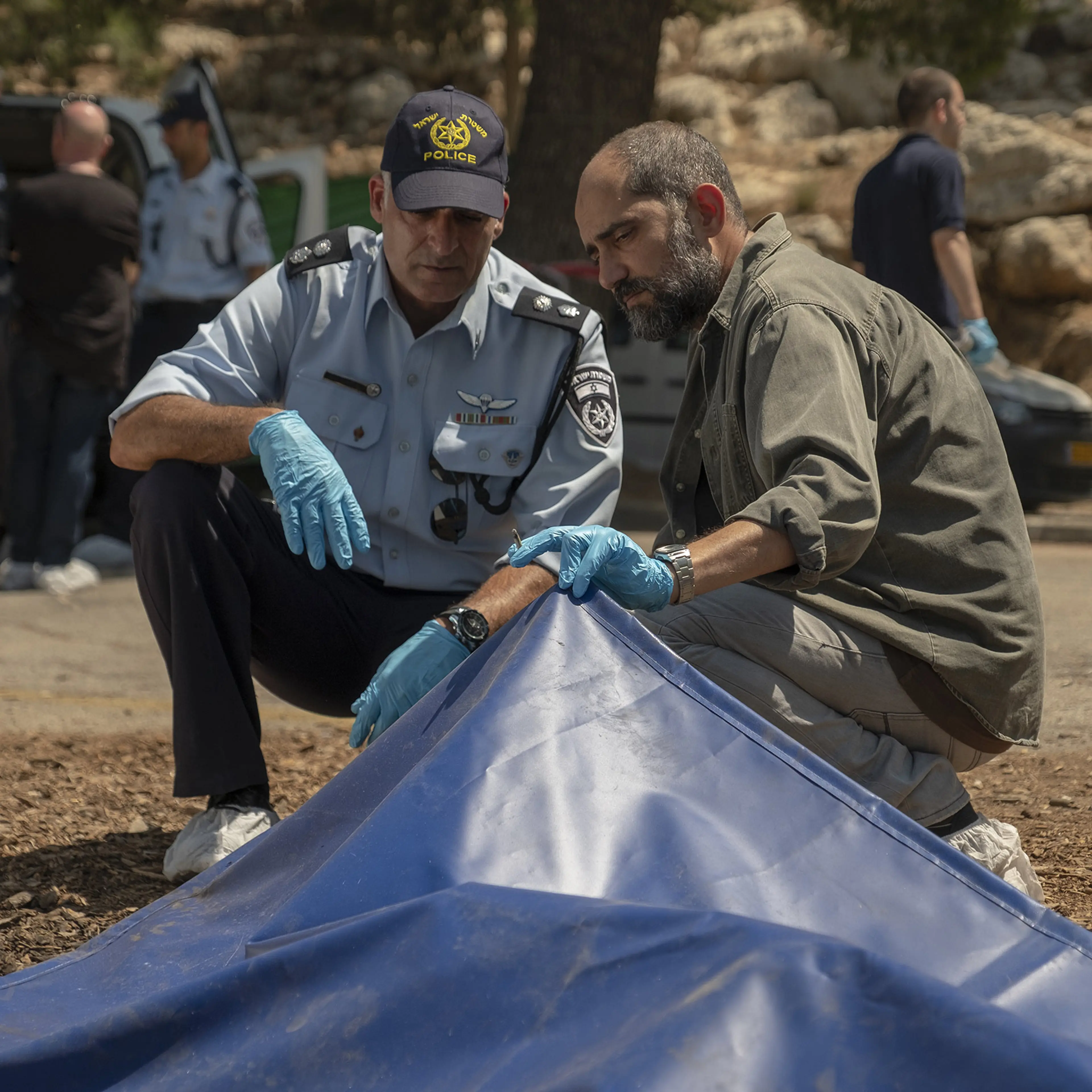 Simon (Elkabetz), right, grapples with the heavy cost of violent conflict.