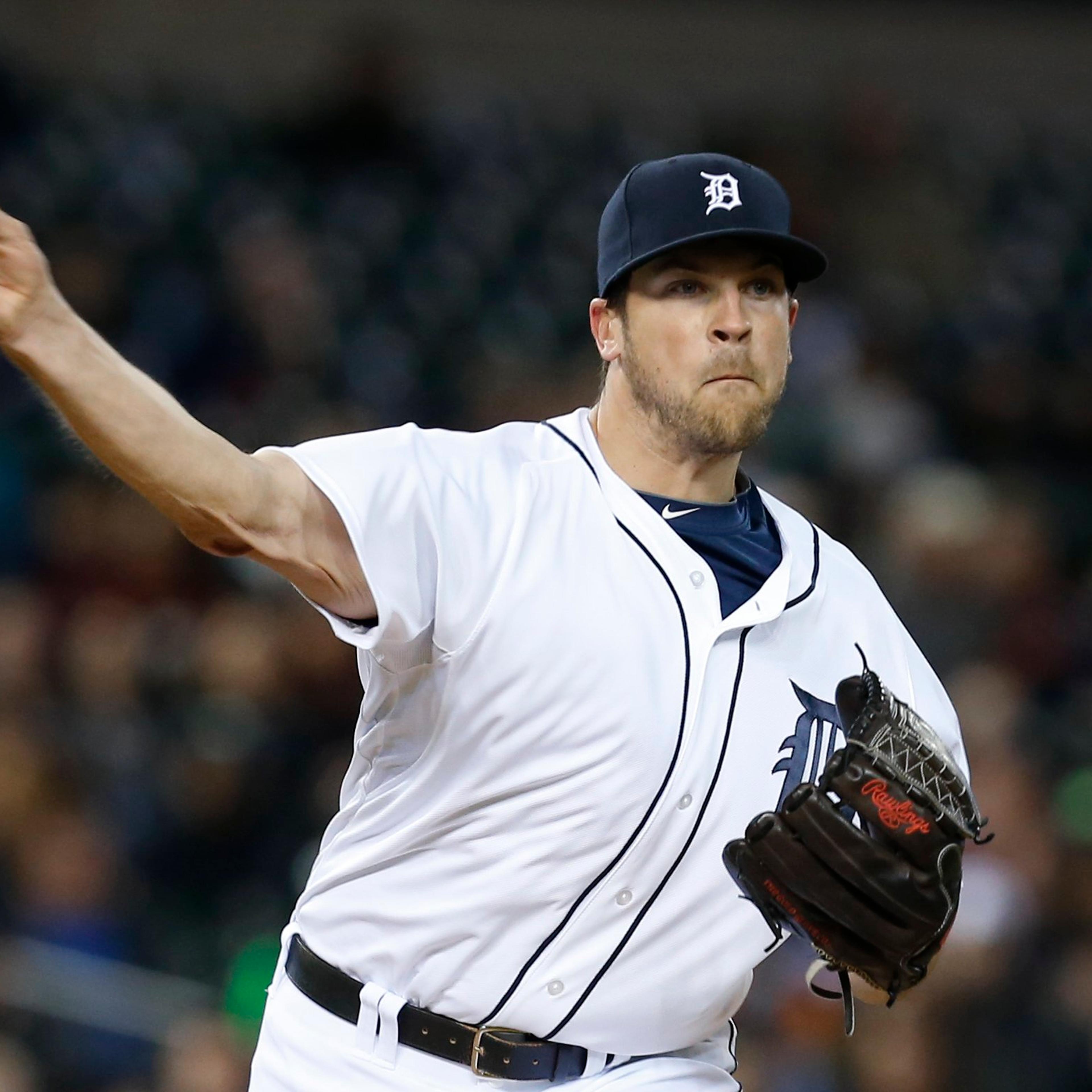 Detroit Tigers pitcher Evan Reed throws against the Houston Astros in the seventh inning of a baseball game in Detroit on May 6, 2014.
