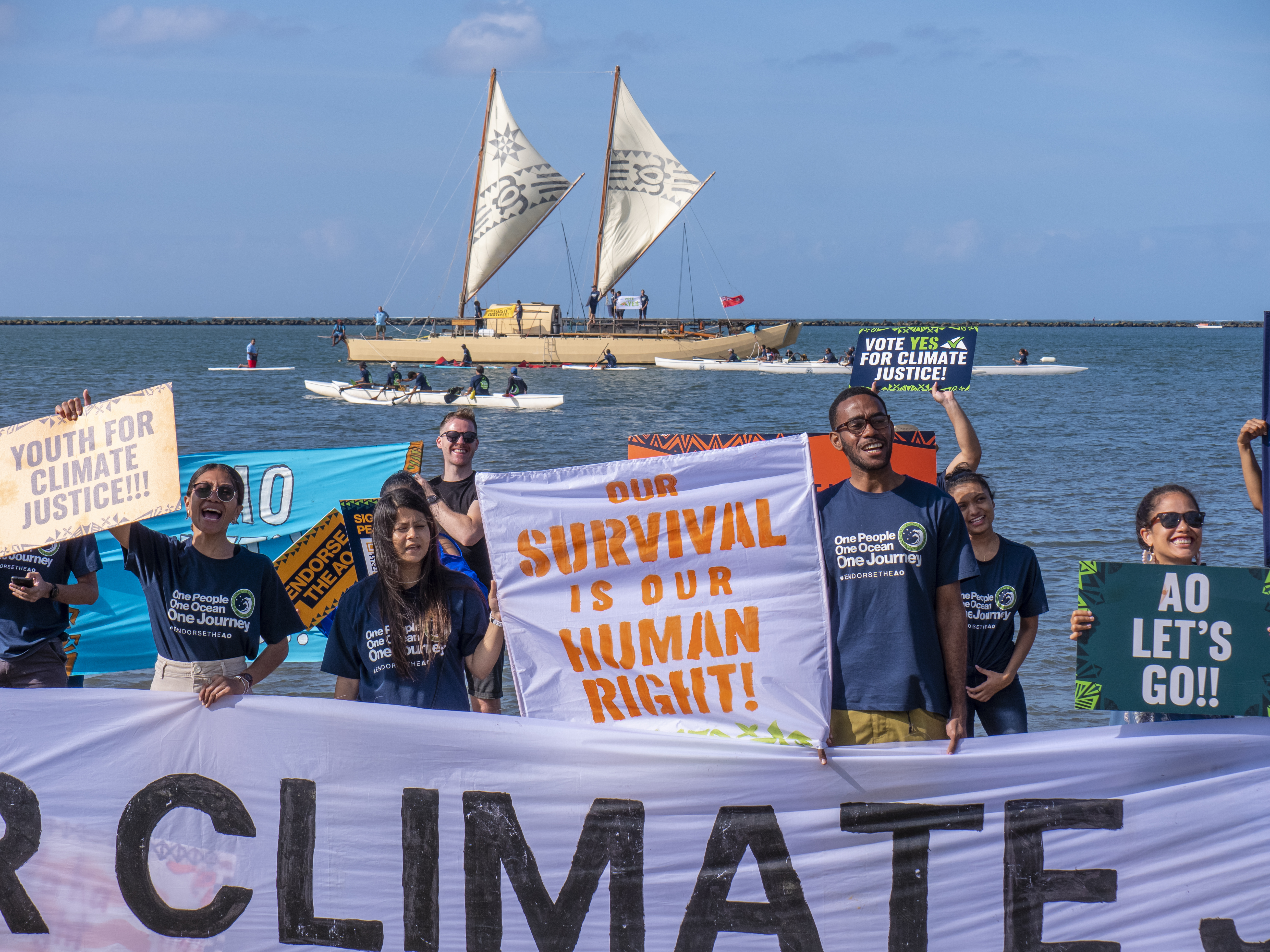 Climate activists call on Pacific Islands leaders to endorse Vanuatu's push for the International Court of Justice to issue an advisory opinion on climate change in Suva, Fiji on July 9, 2022.