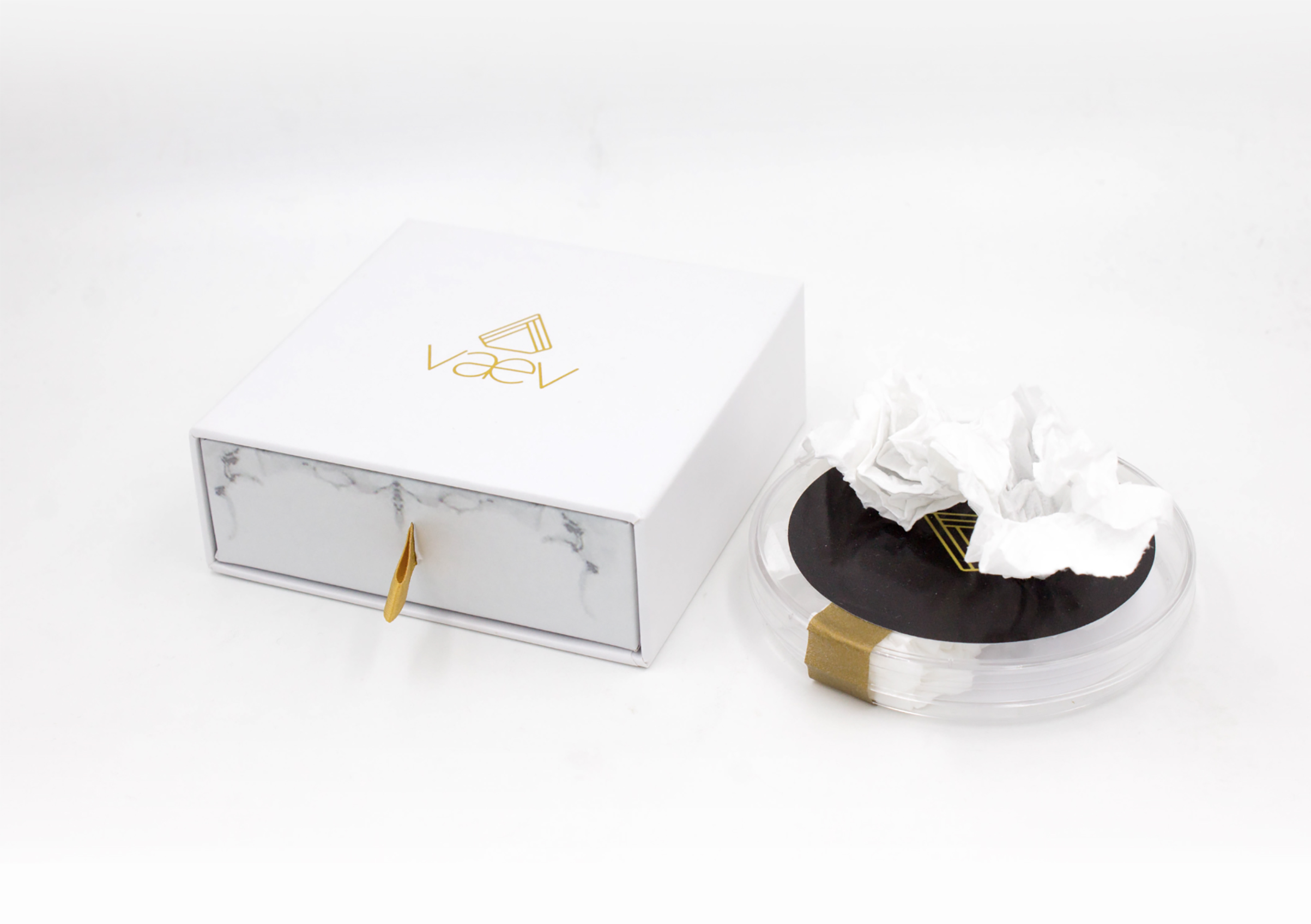 Vaev tissue box and tissue