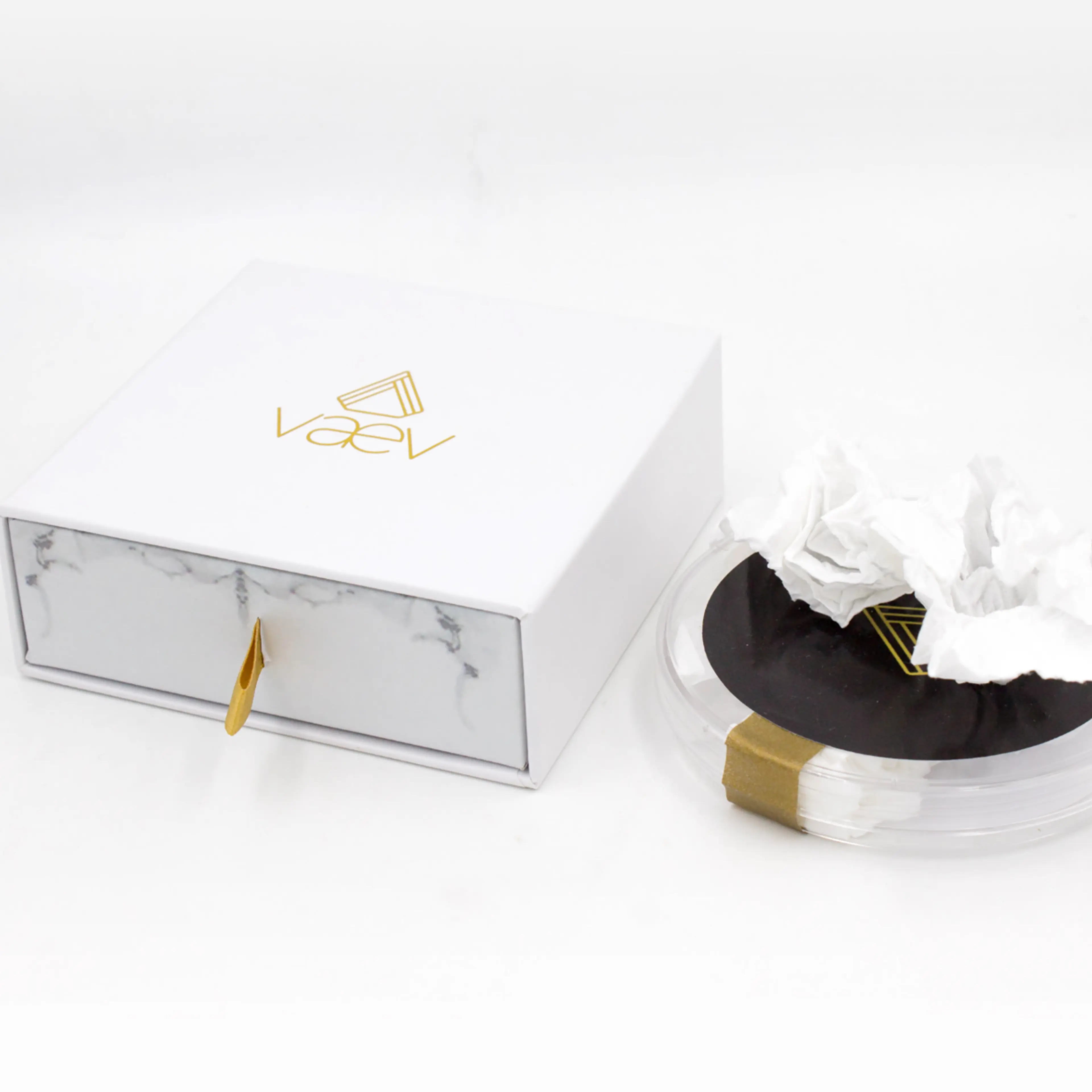 Vaev tissue box and tissue