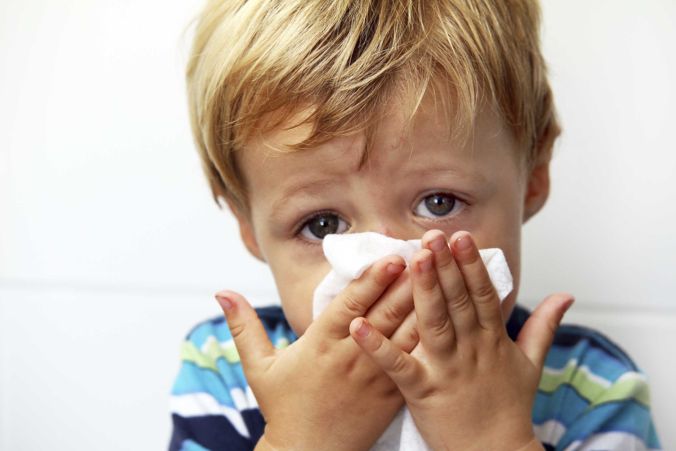 Sick Child with tissue
