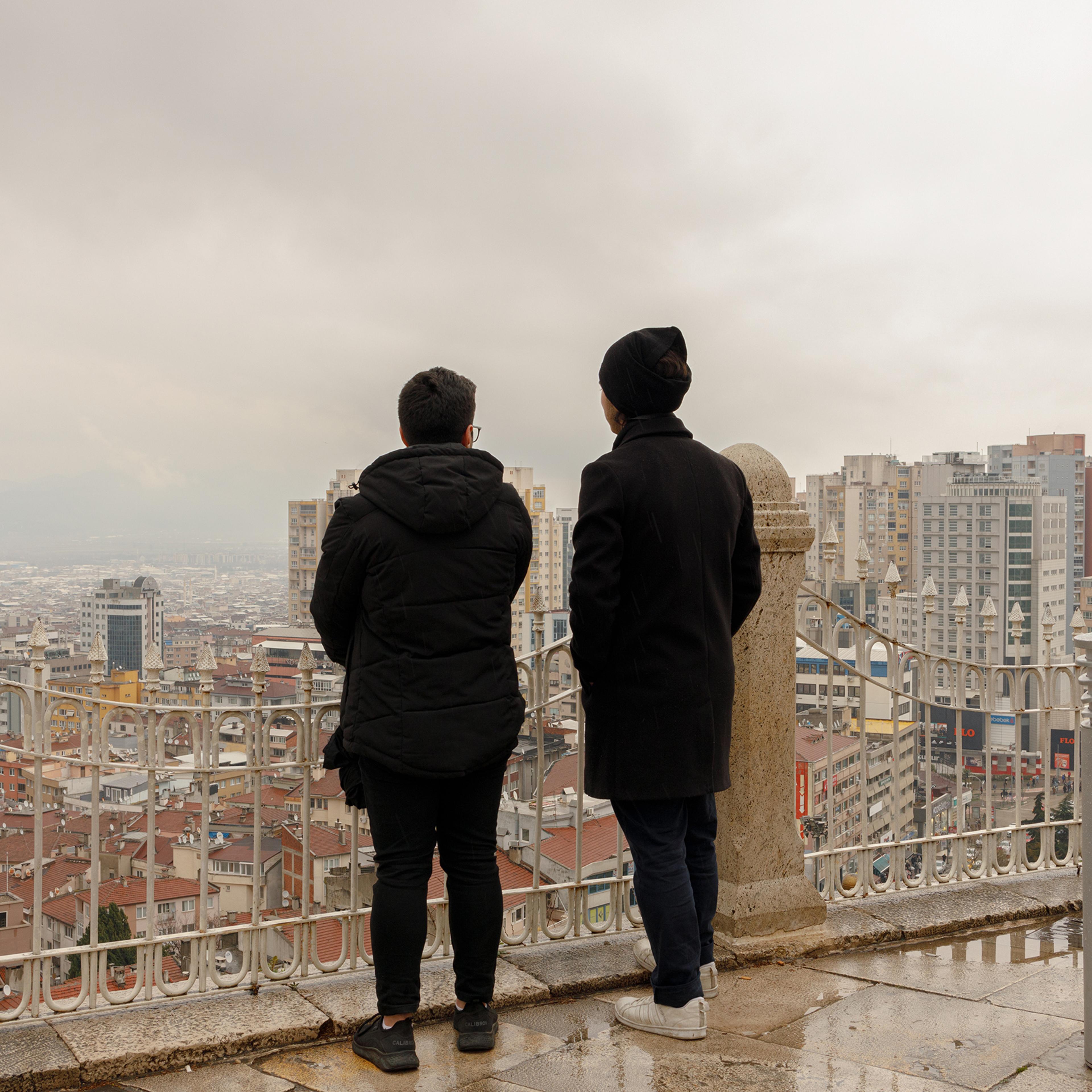 Mehdi*, 23, and Samir*, 24, originally from Aleppo and based in Gaziantep, Turkey, look out at Bursa, a city close to Istanbul where the two brothers found refuge after the Turkish government granted 60-days travel permission to Syrians under temporary protection, in April. (Their names have been changed.) The $500 provided by the government to all affected families also helped Mehdi and Samir to temporarily move away from their adopted city, while the aftershocks continued.