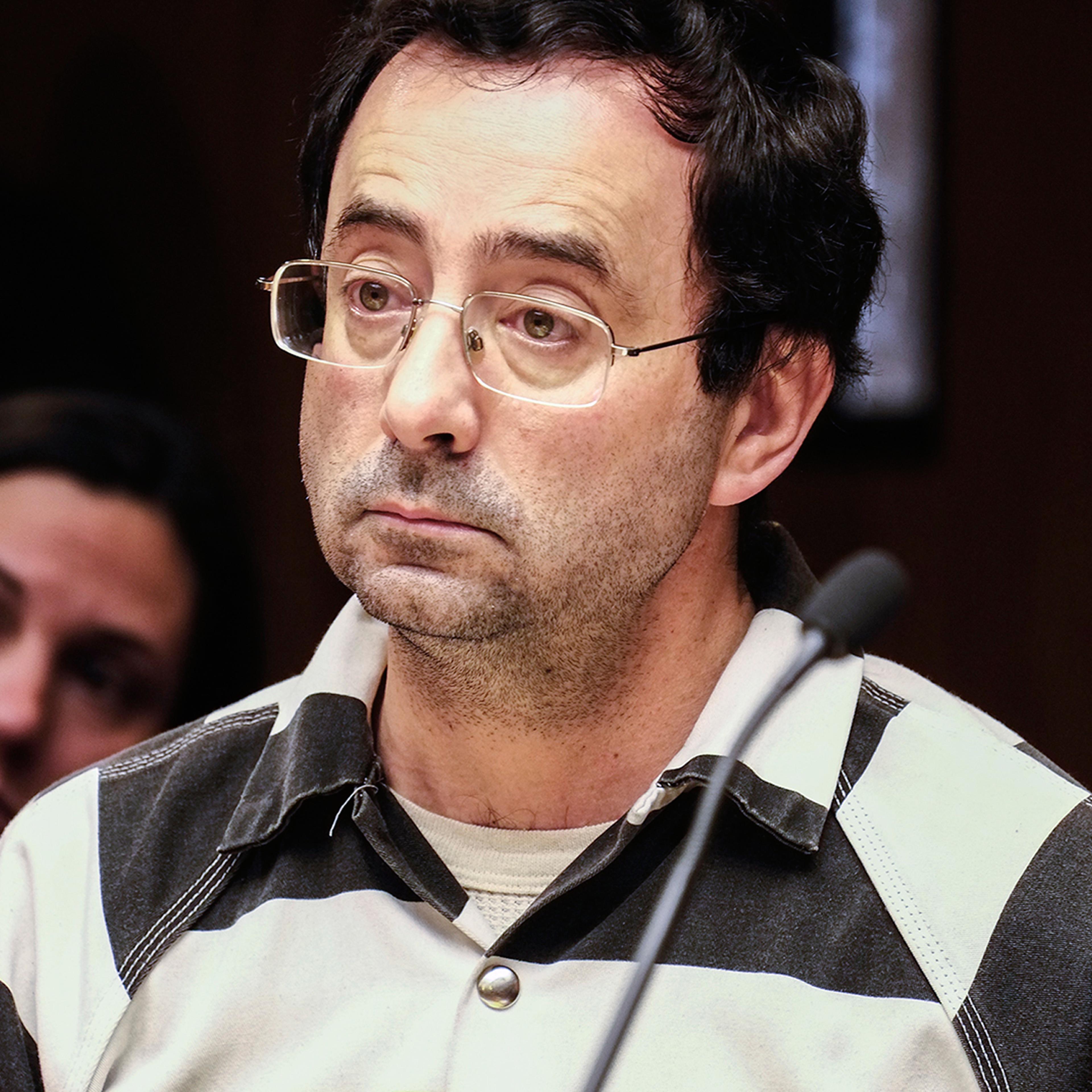 Dr. Larry Nassar listens to testimony of a witness during a preliminary hearing Friday, Feb. 17, 2017, in Lansing, Mich. A judge on Friday ordered Nassar, a former Michigan State University and USA Gymnastics sports doctor, to stand trial on sexual assau
