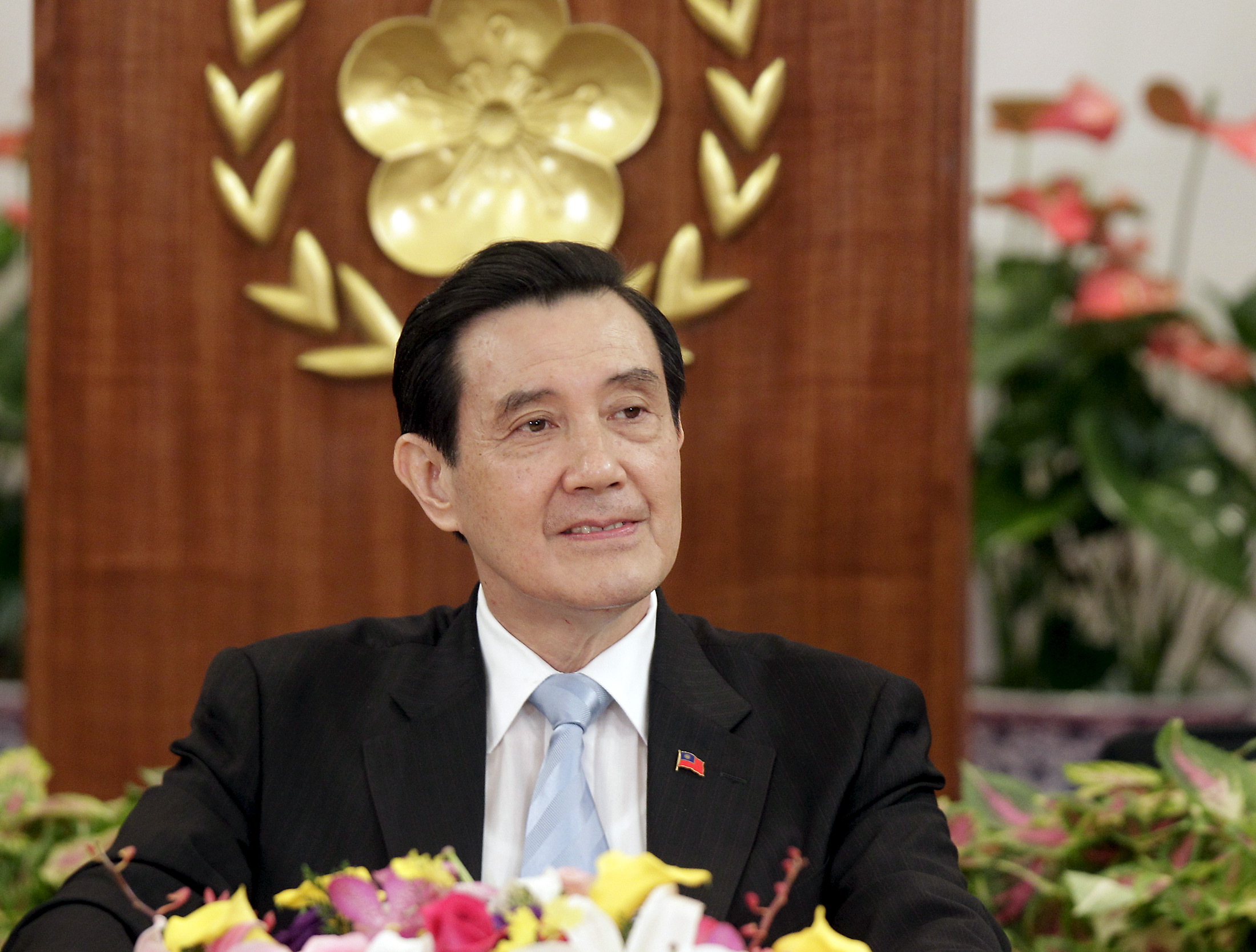Taiwan's President Ma Ying-jeou listens to a question during a news conference before his upcoming meeting with Chinese President Xi Jinping, at the Presidential Office in Taipei